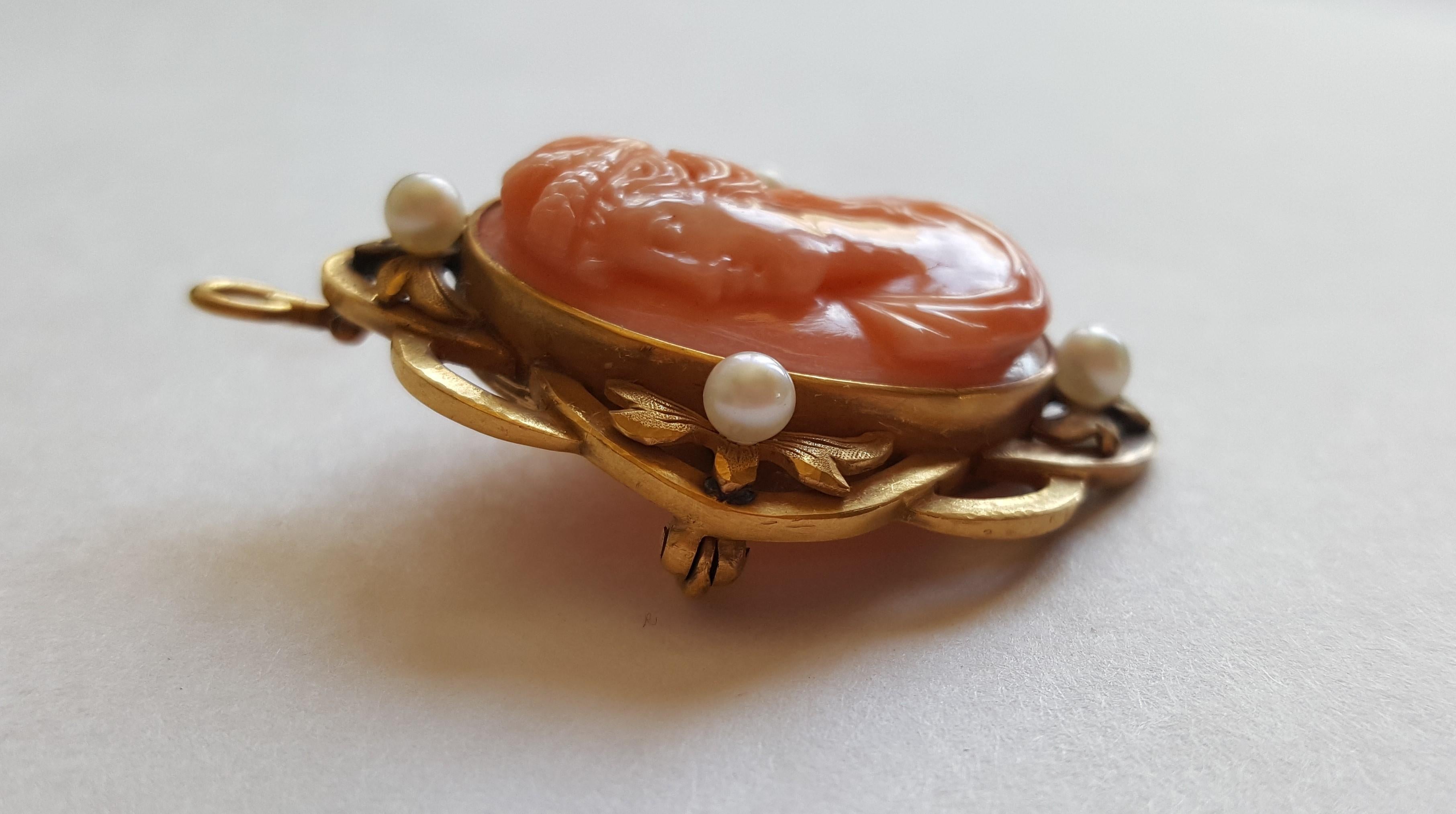 Vintage 14kt Yellow Solid Gold Cameo Pin/Pendant, 3.5mm Small White Natural Pearls, 37mm X 31mm Diameter, 12.7 Grams, Heavy.

The pin is not marked, however, we're professional jewelers and we've tested the gold and it's 14k yellow gold solid. This