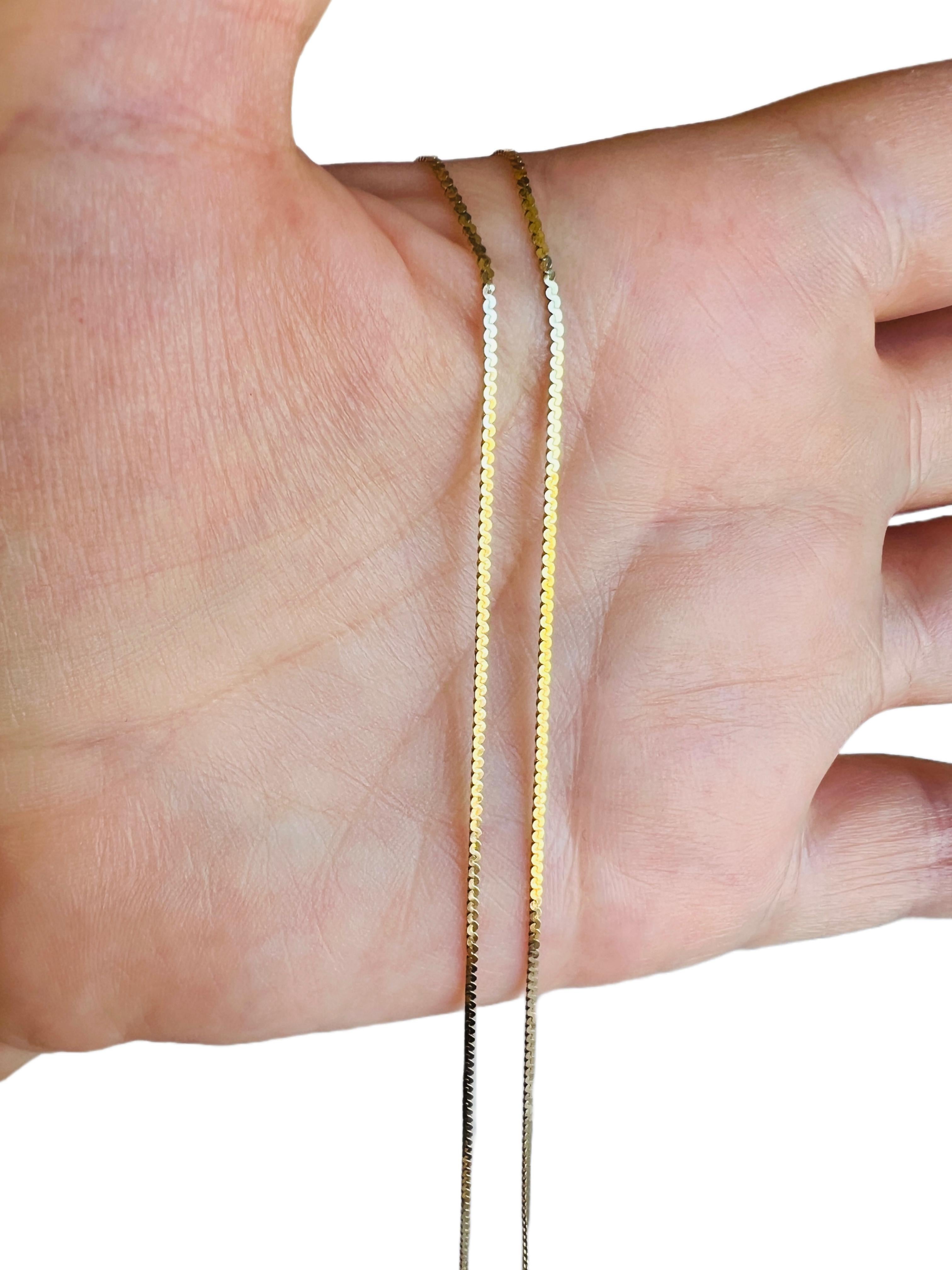 This elegant 14k yellow gold chain necklace is perfect alone or as a layering piece!

Marked: 14k 585 Italy 
Length: 14 7/8 