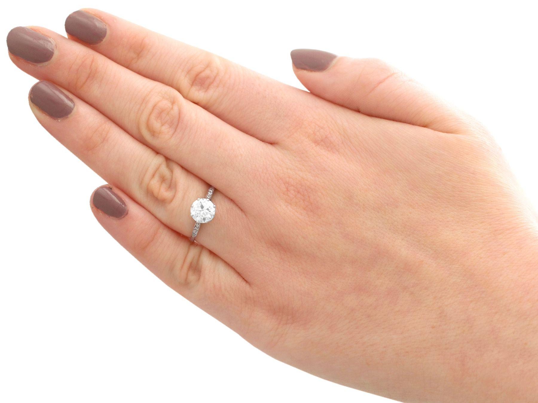 Round Cut Vintage 1.5 Carat Diamond and Platinum Solitaire Engagement Ring