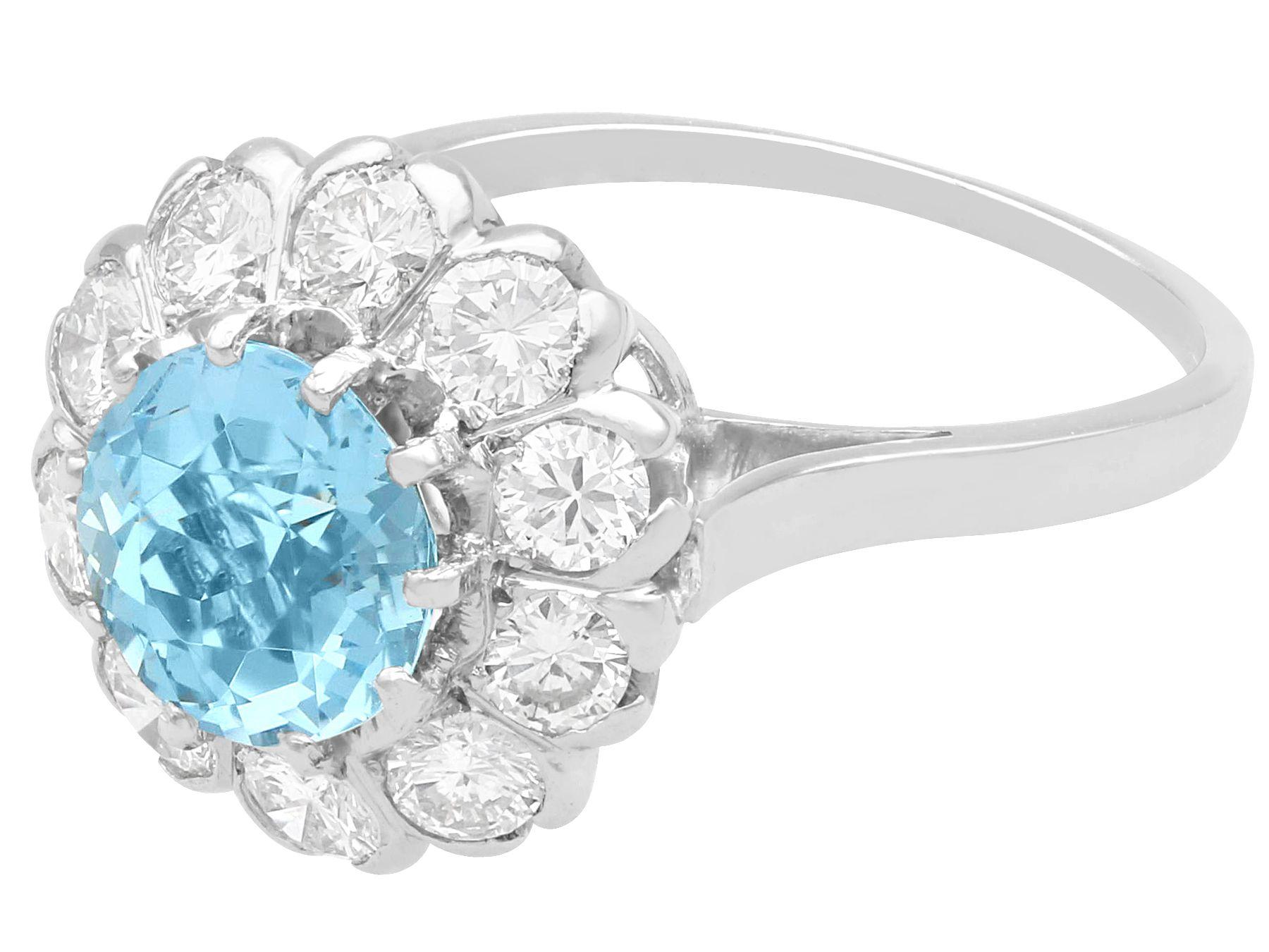 A stunning, fine and impressive 1.50 carat aquamarine and 0.95 carat diamond platinum cluster ring; part of our diverse vintage jewellery collections.

This stunning, fine and impressive aquamarine and diamond ring has been crafted in platinum.

The