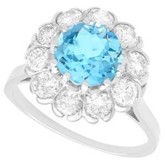 Vintage 1.50 Carat Aquamarine and 0.95 Carat Diamond Platinum Cluster Ring