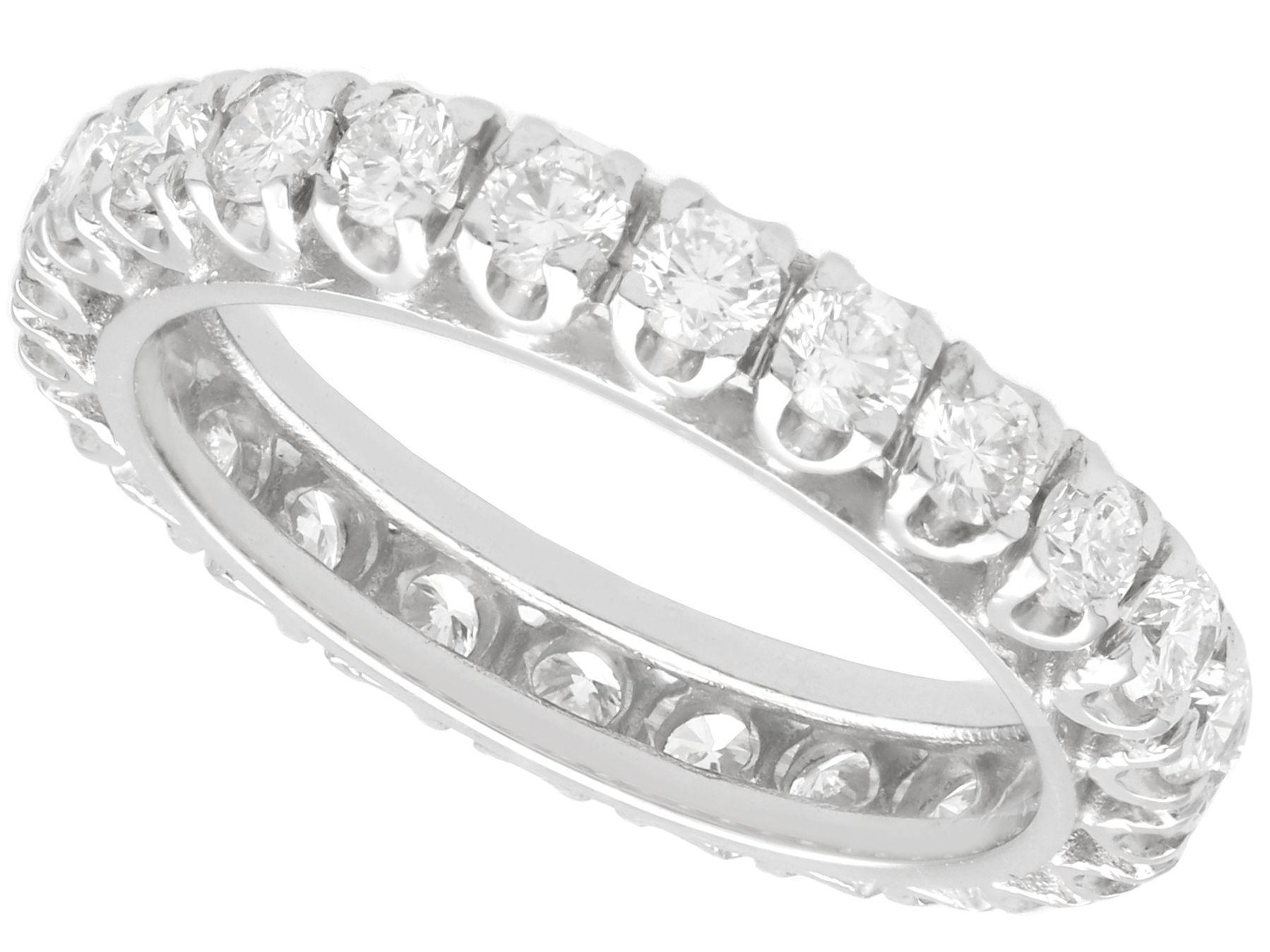 A stunning, fine and impressive vintage 1.50 carat diamond and 14 carat white gold full eternity ring; part of our diverse diamond jewelry and estate jewelry collections.

This fine and impressive vintage diamond ring has been crafted in 14K white