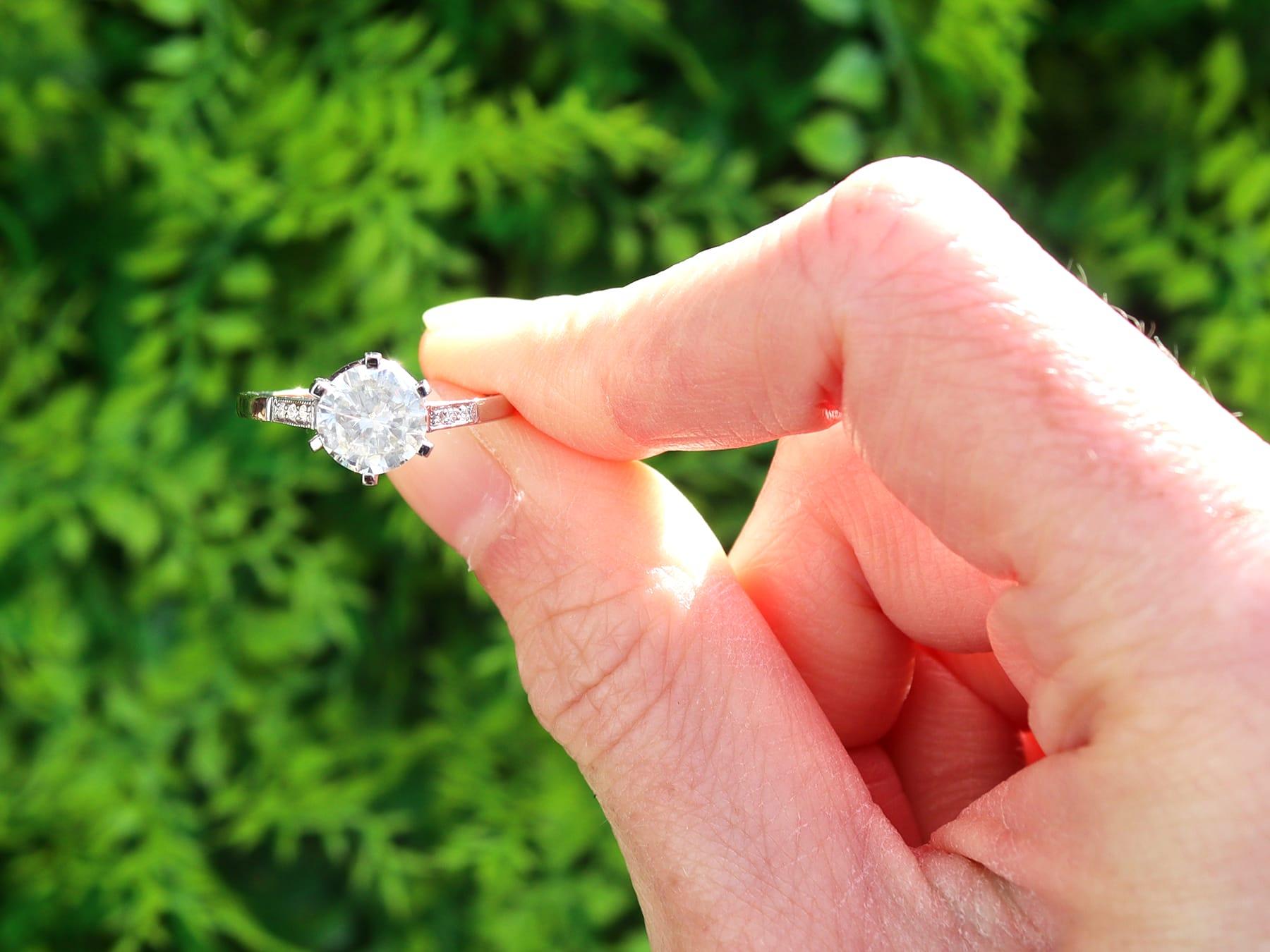 A stunning, fine and impressive vintage 1.50 carat diamond and platinum solitaire ring; part of our vintage engagement ring collections.

This stunning vintage solitaire ring has been crafted in platinum.

The pierced decorated setting is