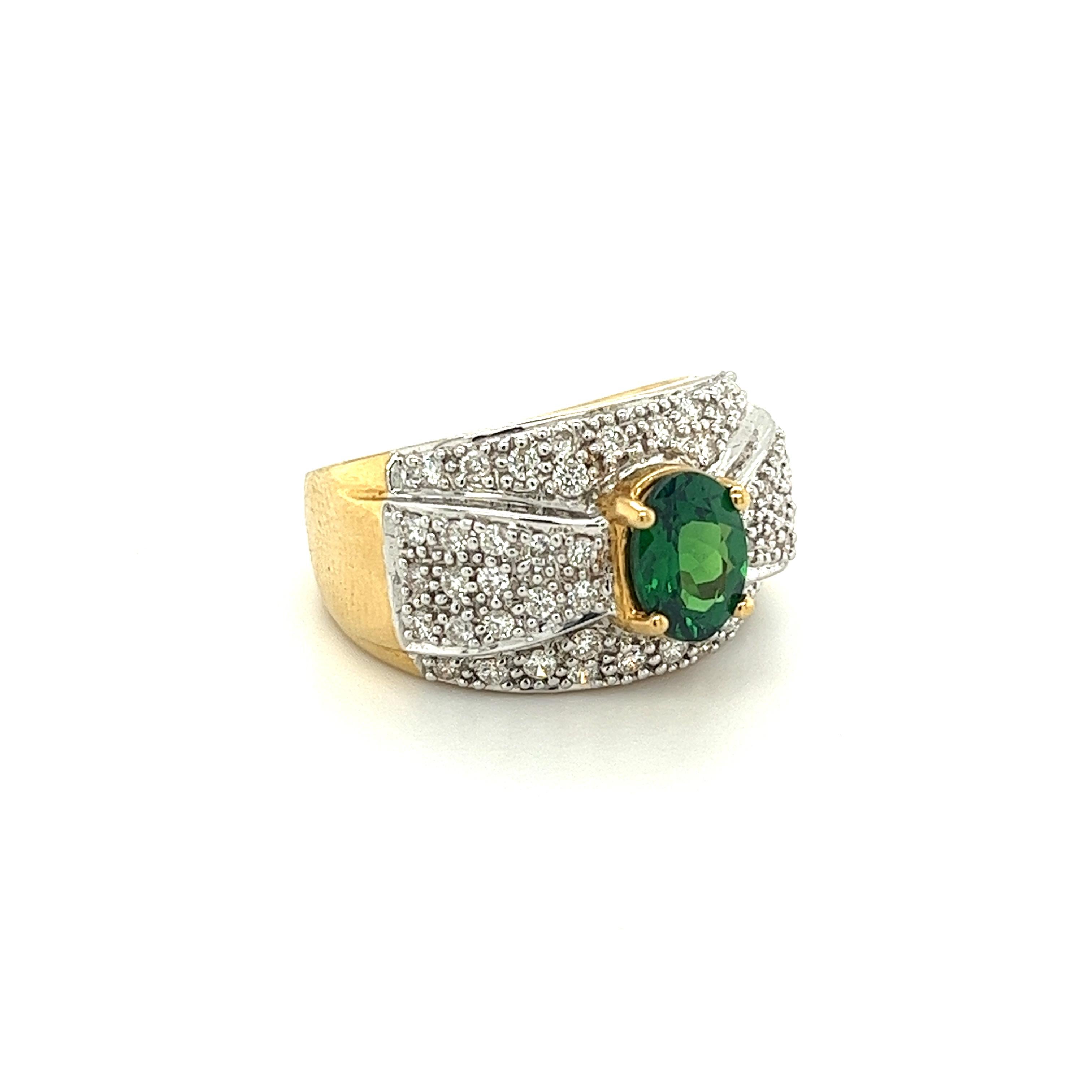 Vintage 1.50 Carat Oval Cut Green Tsavorite and Diamond Cluster Ring For Sale 1