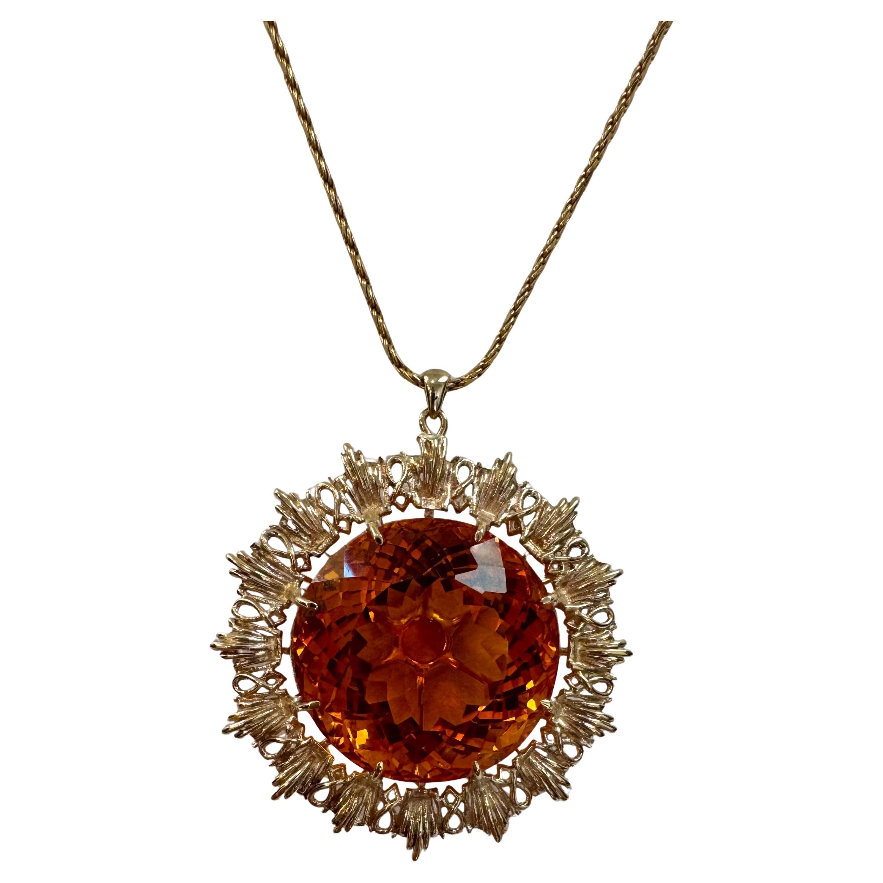 Vintage 150 Ct Round Shape Citrine Pendent  14 Kt Yellow Gold with Chain Italy
Stunning 150 Ct Round Citrine Pendant Necklace in 14K Yellow Gold with Chain from Italy 

This impressive pendant necklace boasts a dazzling 150 carat round citrine,