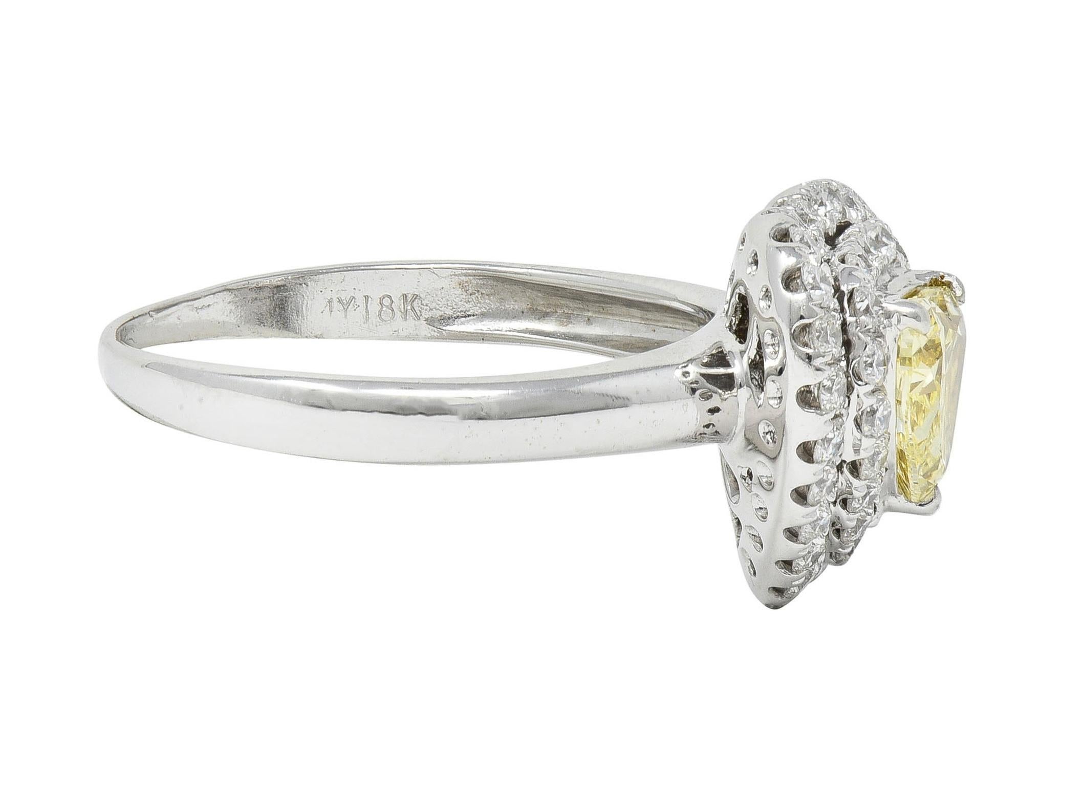 Women's or Men's Vintage 1.50 CTW Fancy Light Yellow Heart Diamond 18 Karat Gold Halo Ring GIA For Sale
