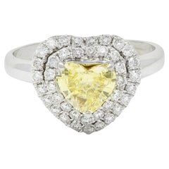Retro 1.50 CTW Fancy Light Yellow Heart Diamond 18 Karat Gold Halo Ring GIA