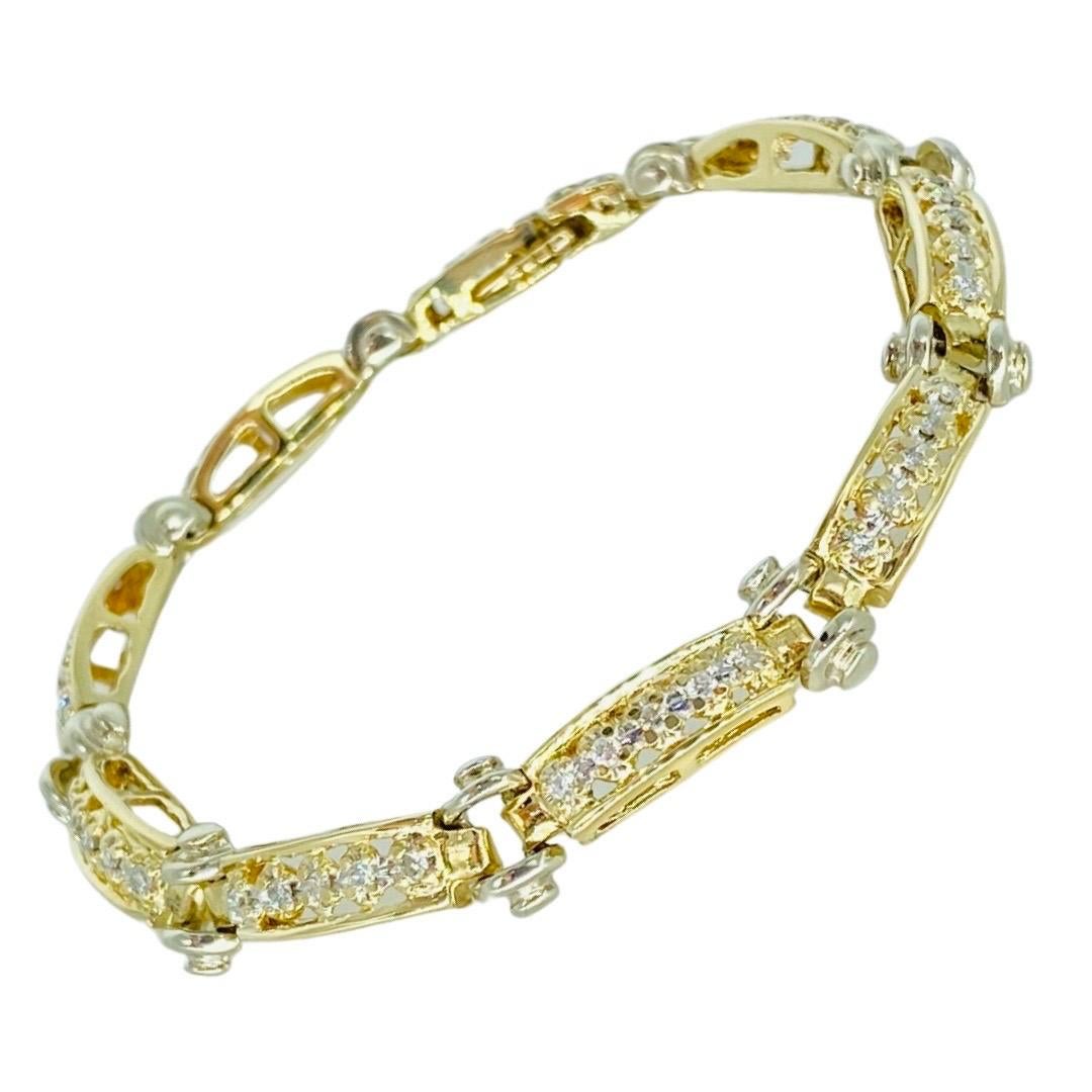 Vintage 1.50 Total Carat Weight Diamonds Two-Tone 14k Gold Bracelet. The diamonds featured in this bracelet are round cut and total weight of 1.50 carat. The bracelet is made in 14 karat yellow gold and white gold. The bracelet weights 14.3 grams