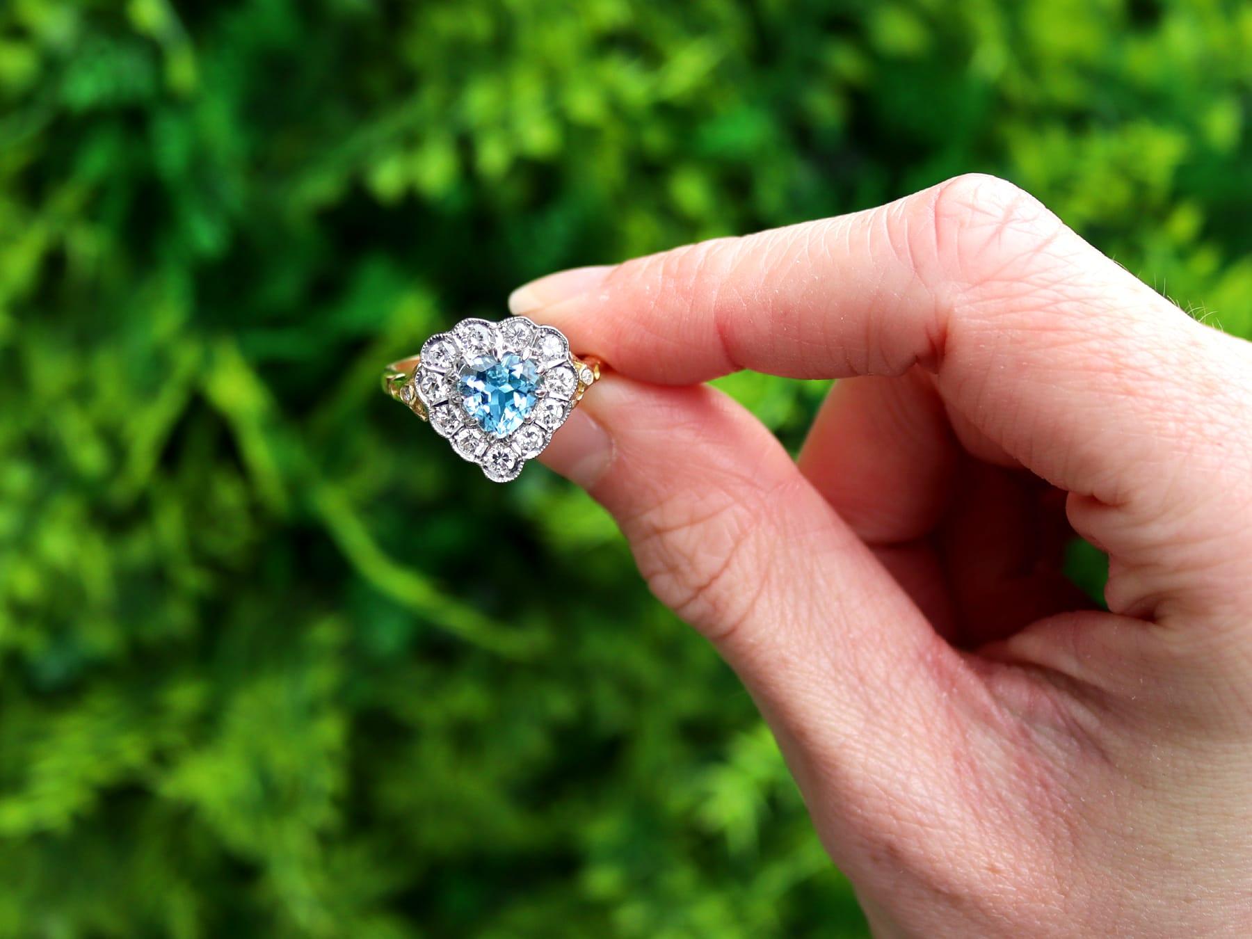 A fine and impressive 1.50 carat aquamarine and 0.88 carat diamond, 18 karat yellow gold and 18 karat white gold set dress ring; part of our diverse vintage jewellery and estate jewelry collections.

This fine and impressive vintage aquamarine ring