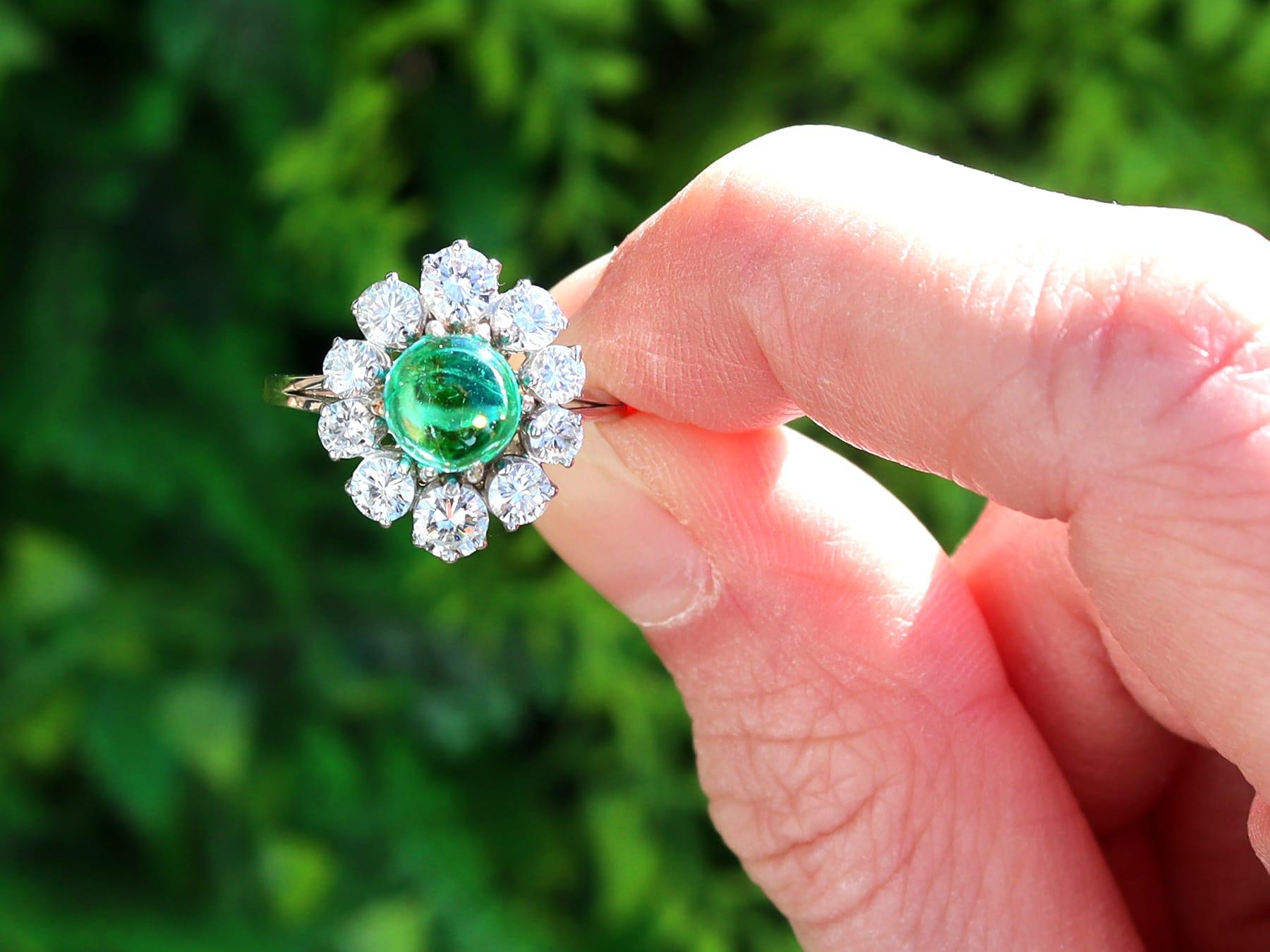 A stunning, fine and impressive vintage French 1.50 carat emerald and 2.40 carat diamond, 18 karat white gold and platinum set dress ring; part of our diverse vintage jewelry collections.

This stunning, fine and impressive vintage emerald cluster
