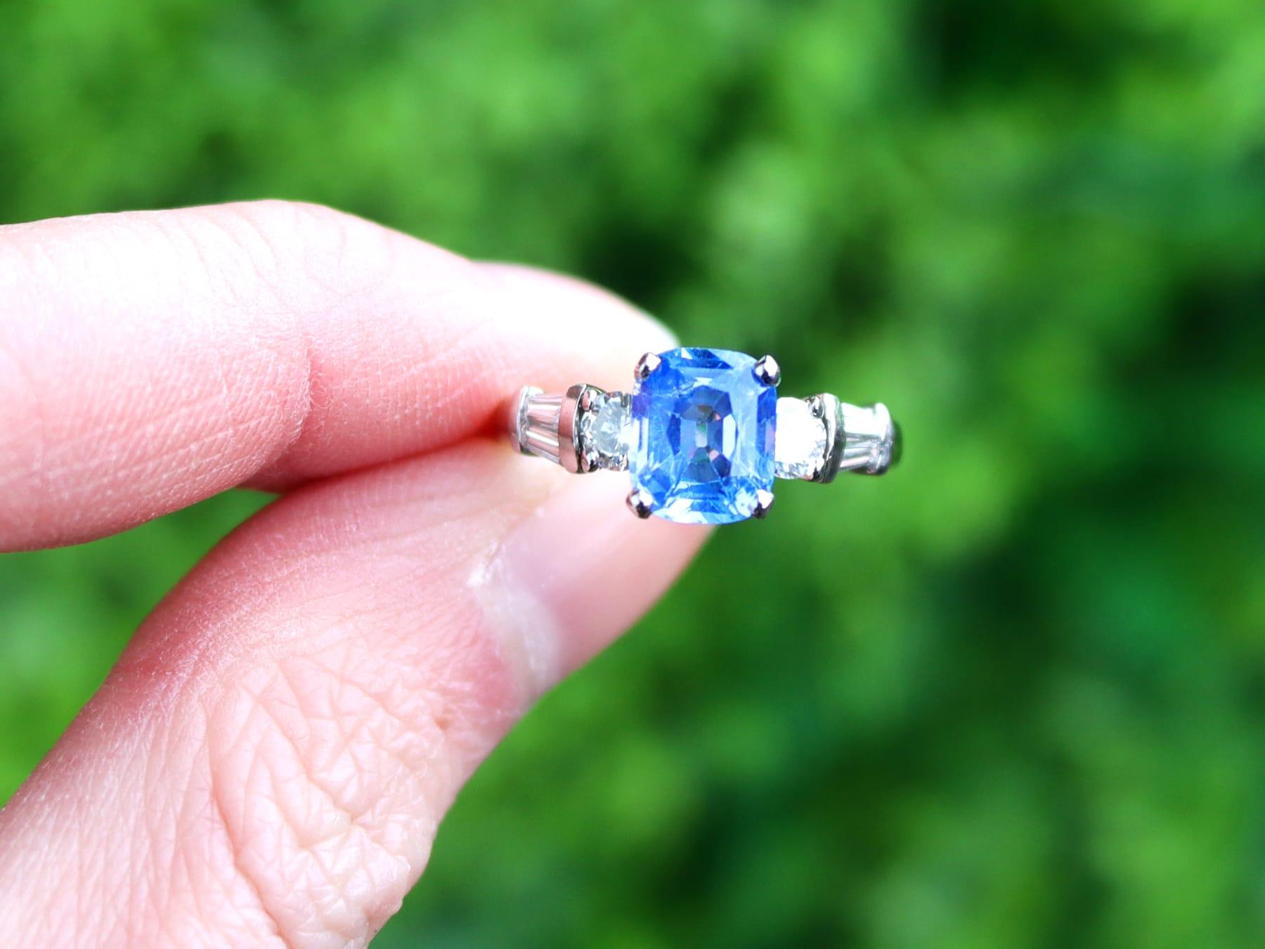 A stunning and impressive vintage 1.52 carat Ceylon sapphire and 0.68 carat diamond, platinum dress ring; part of our diverse antique estate jewelry collections

This stunning, fine and impressive vintage sapphire ring has been crafted in