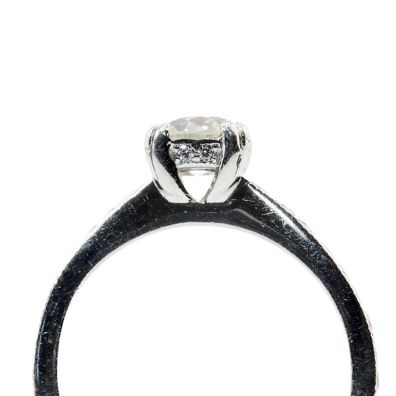 Women's Vintage 1.52ctw Old European Cut Diamond Hidden Halo Engagement Ring in Platinum For Sale