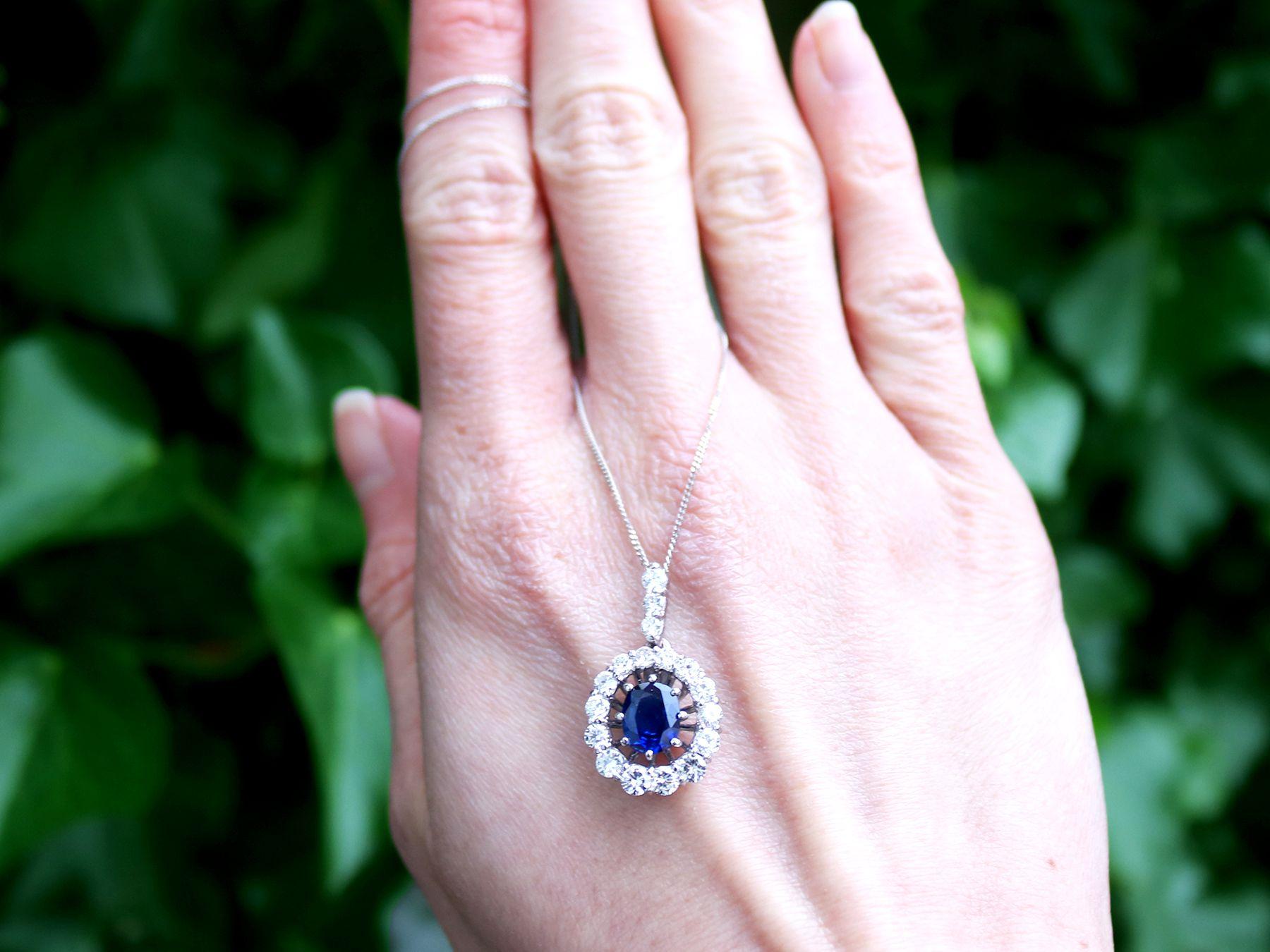 A stunning, fine and impressive 1.54 carat sapphire and 0.96 carat diamond, 18 karat white gold cluster pendant; an addition to our vintage jewelry and estate jewelry collections

This stunning, fine and impressive vintage pendant has been crafted