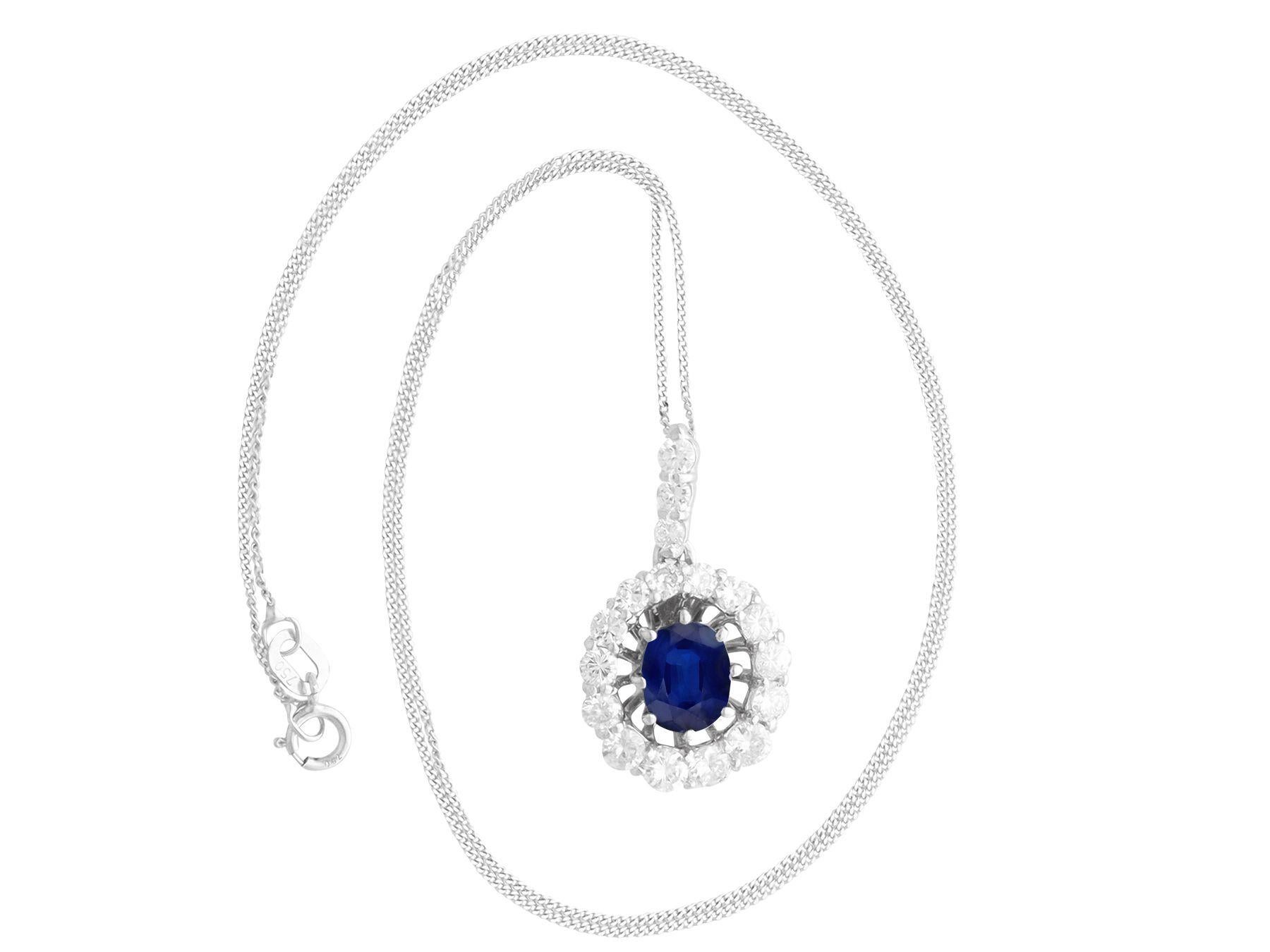 Oval Cut Vintage 1.54 Carat Sapphire and Diamond White Gold Pendant, Circa 1950 For Sale