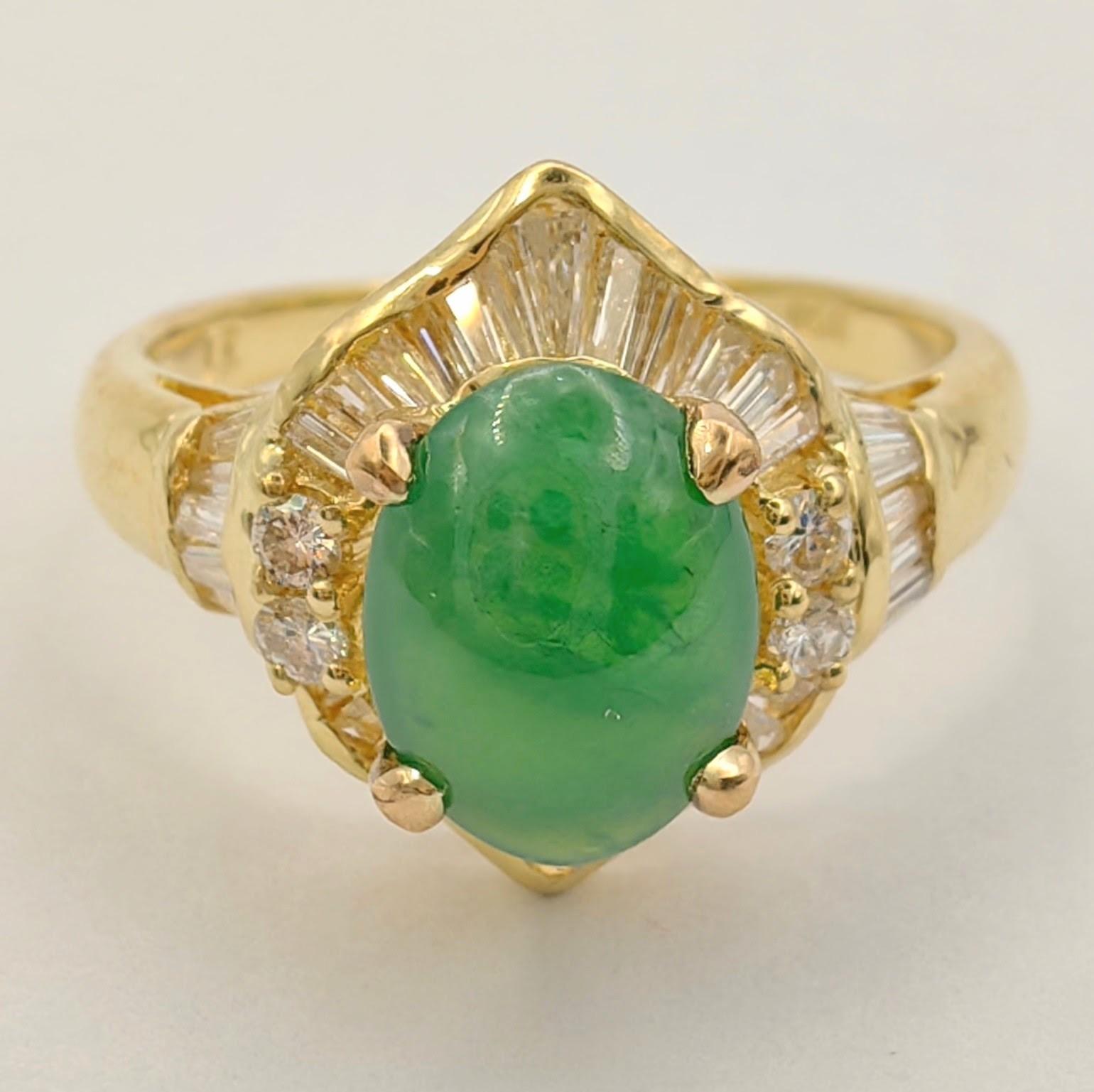 Introducing our extraordinary 1.56 Carat Oval Cabochon Apple Green Jadeite Jade Diamond Ring in 20K 850 Gold, a breathtaking piece that combines the allure of jadeite jade with the brilliance of diamonds.

The centerpiece of this ring is a