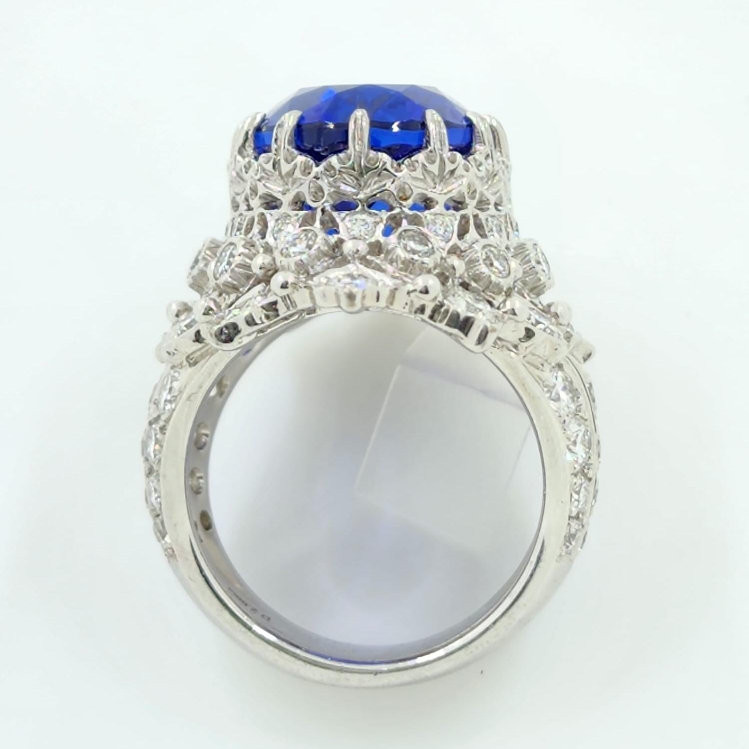 Feast your eyes on a masterpiece of craftsmanship and design, our extraordinary Tanzanite and Diamond Ring. This opulent piece is the epitome of luxury, a celebration of time, skill, and the finest materials, with over two months of meticulous
