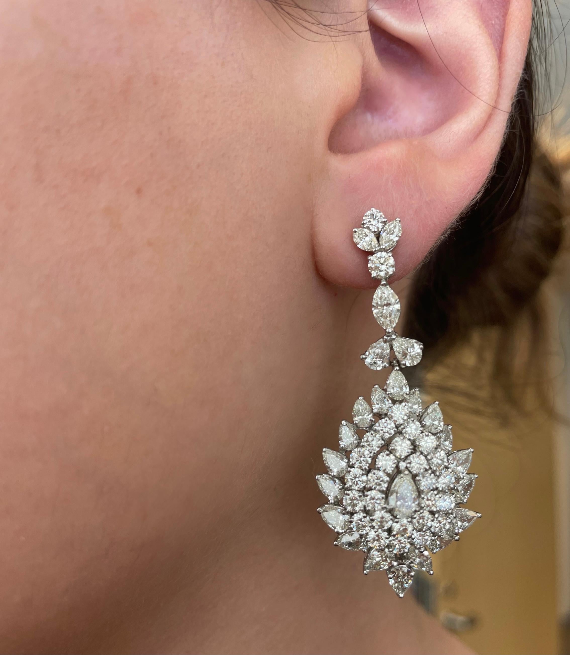 Stunning vintage chandelier high jewelry earrings.
Approximately 15.75 carats of pear, marquise and round brilliant diamonds. Approximately H/I color grade and VS2/SI1 clarity grade. 18-karat white gold, 18.02 grams. 
Accommodated with an up-to-date