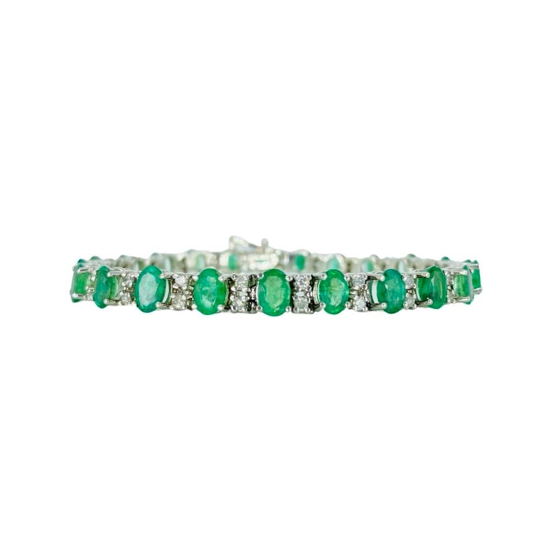 Vintage 15.92 Carat Total Weight Emerald and Diamonds Tennis Bracelet White Gold. The emeralds gemstones are oval shaped and approx total weights 15 carats and the white round diamonds weight approx 0.92 carat total weight. The bracelet weights a