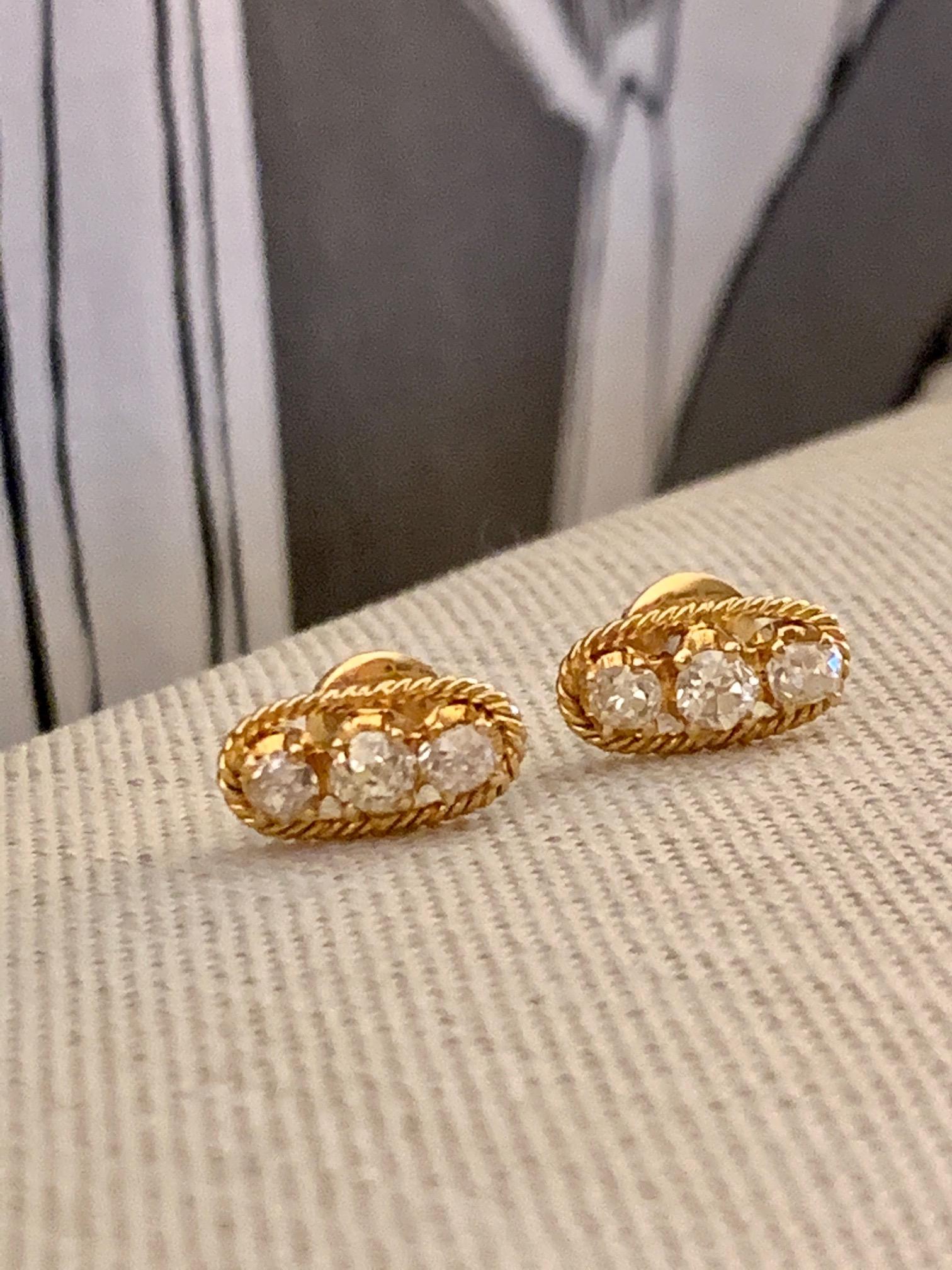 These amazing vintage post earrings feature three mine cut Diamonds on each earring.  The Diamonds range in size from 3.5-4.2mm and total 1.5ctw.  
Average grades:  SI- I-L color

Weight:  4.6 grams