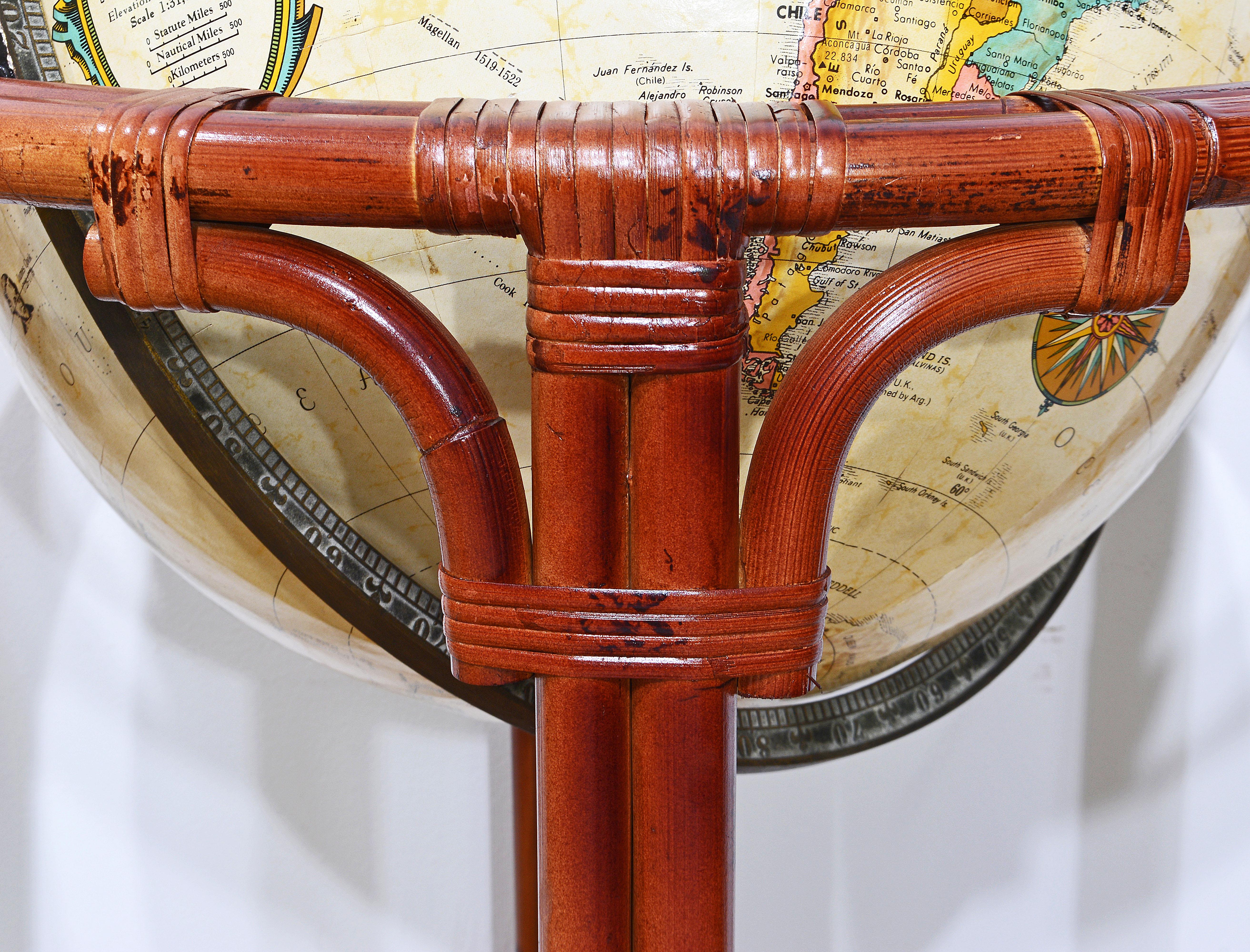 Vintage 16 in. Terrestrial Globe and Tropical Colonial Style Bamboo Rattan Stand In Good Condition For Sale In Ft. Lauderdale, FL
