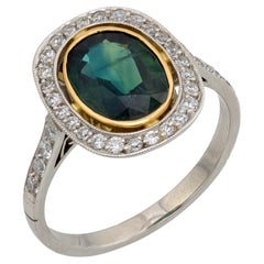 Vintage 1.60 carat green sapphire diamond platinum cluster ring