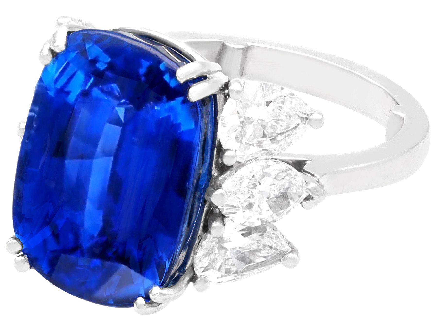 A stunning, fine and impressive vintage 16.38 carat Ceylon sapphire and 3.36 carat diamond, platinum cocktail ring; part of our diverse jewelry and estate jewelry collections.

This stunning, fine and impressive vintage sapphire ring has been