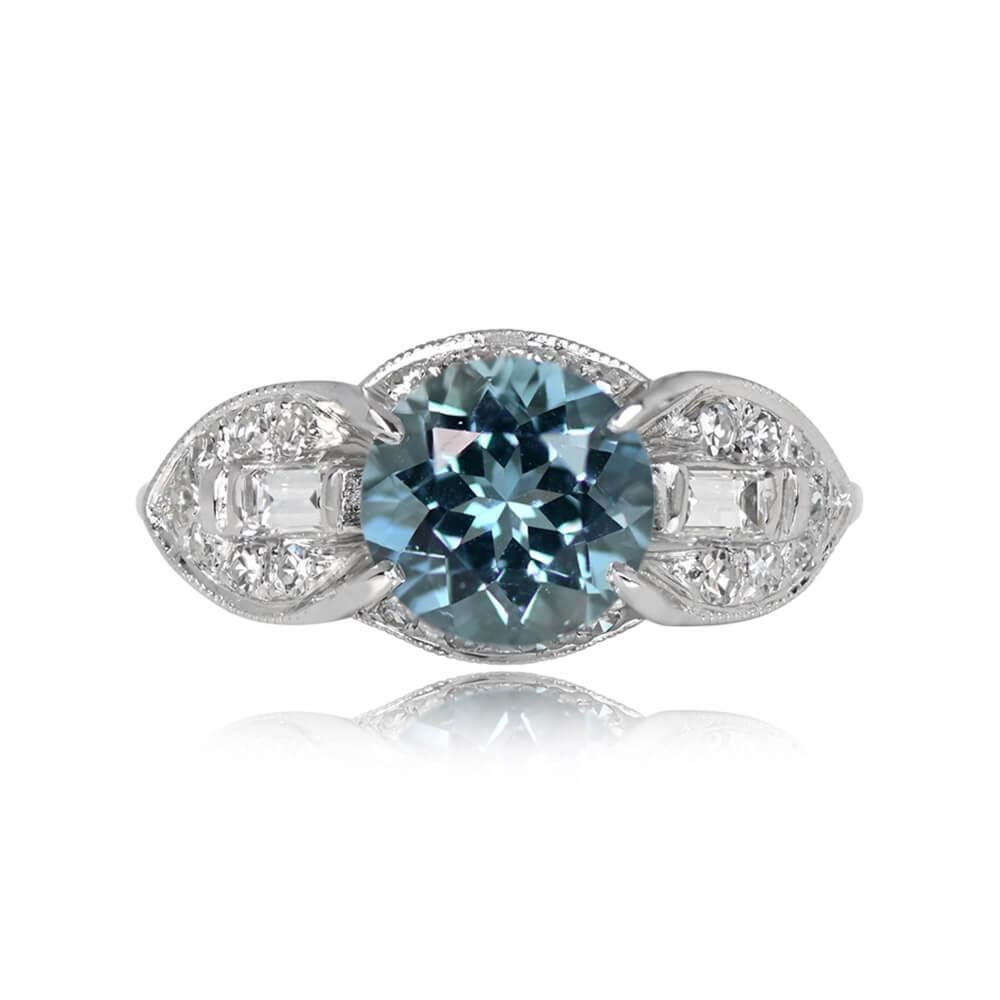 Retro Aquamarine Ring: This vintage beauty boasts a 1.64-carat round aquamarine, set securely in prongs. Geometric shoulders adorned with baguette and single-cut diamonds elegantly frame the center stone. Additional single-cut diamonds line the