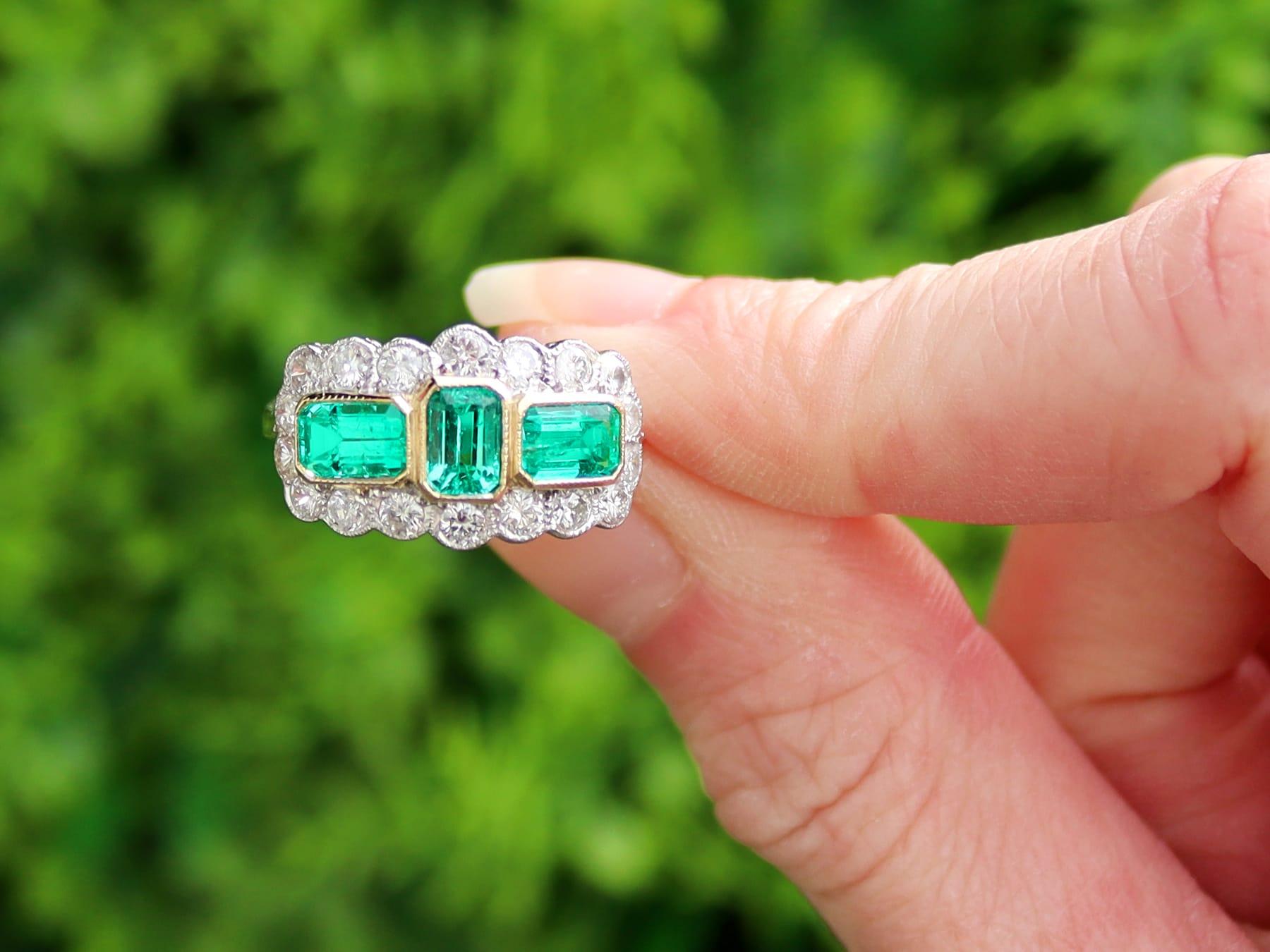 A stunning, fine and impressive vintage 1.65 carat emerald and 1.25 carat diamond, platinum and 18 karat yellow gold set cocktail ring; part of our diverse vintage jewelry collection.

This stunning, fine and impressive vintage emerald and diamond