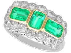 Vintage 1.65 Carat Emerald and 1.25 Carat Diamond Platinum Dress Ring Circa 1990