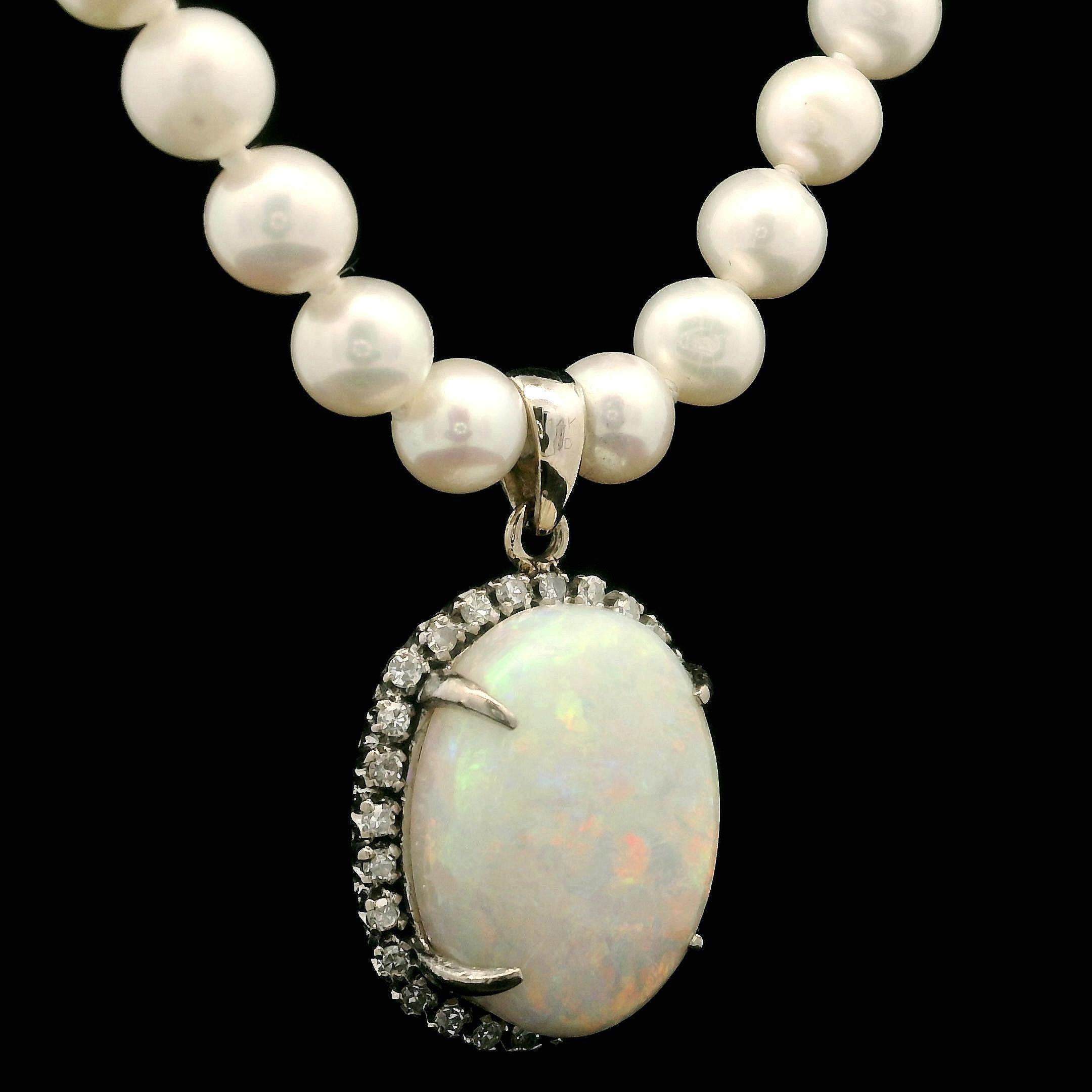 --Stone(s):--
(1) Natural Genuine Opal - Oval Cabochon Cut - Prong Set - White Background w/ Nice Red/Orange Play of Colors - 17.6x13.1mm (approx.)
(28) Natural Genuine Diamonds - Old Single Cut - Prong Set - Nice White Color - 0.30ctw