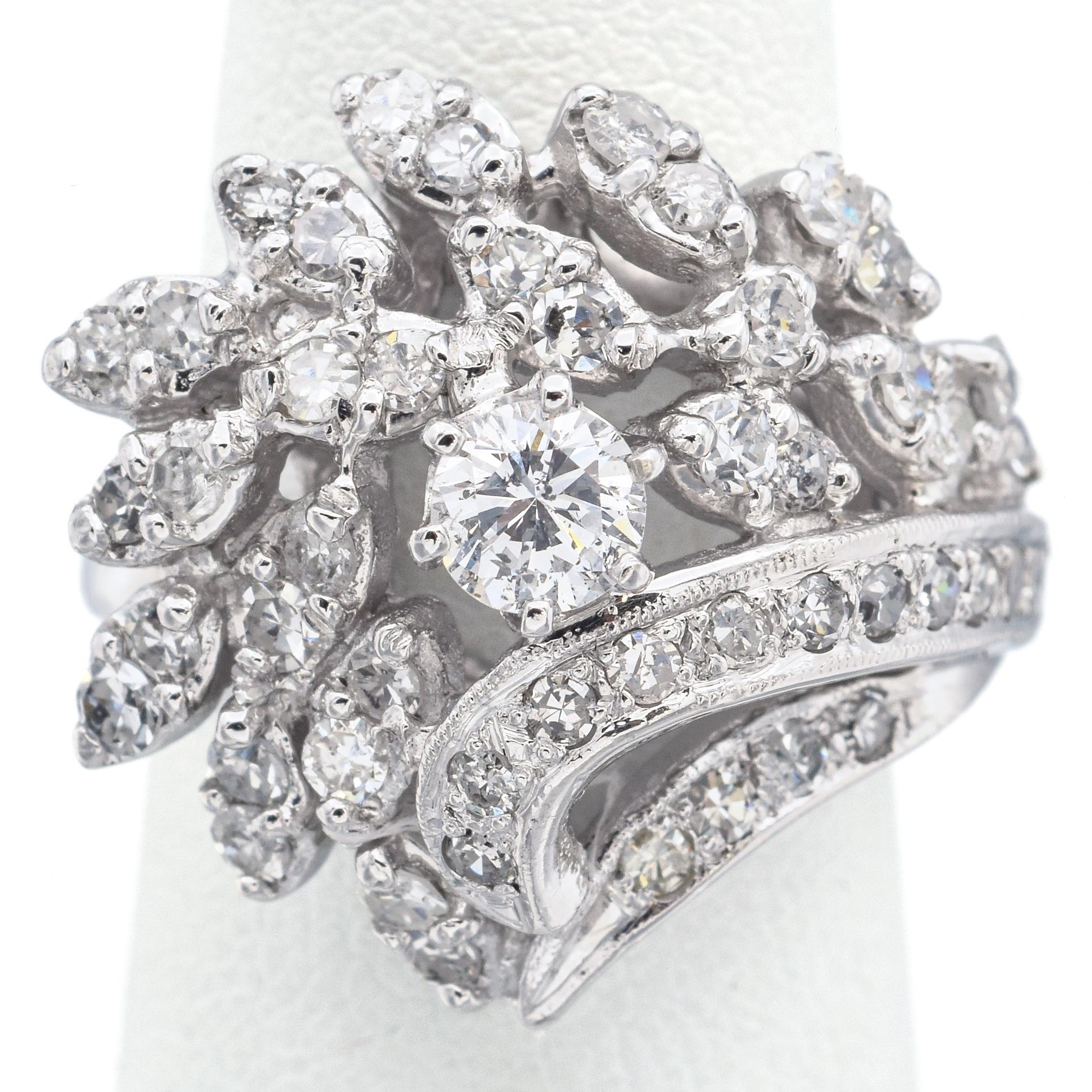 Weight: 8.6 Grams
Stone: Approx 1.65 TCW (0.36 ct center & 0.02-0.03 side) H/J SI-I Diamonds
Face of Ring: 23.0 x 21.0 x 11.2 mm
Size: 5
Hallmark: 14K

ITEM #: BR-1056-092123-13
