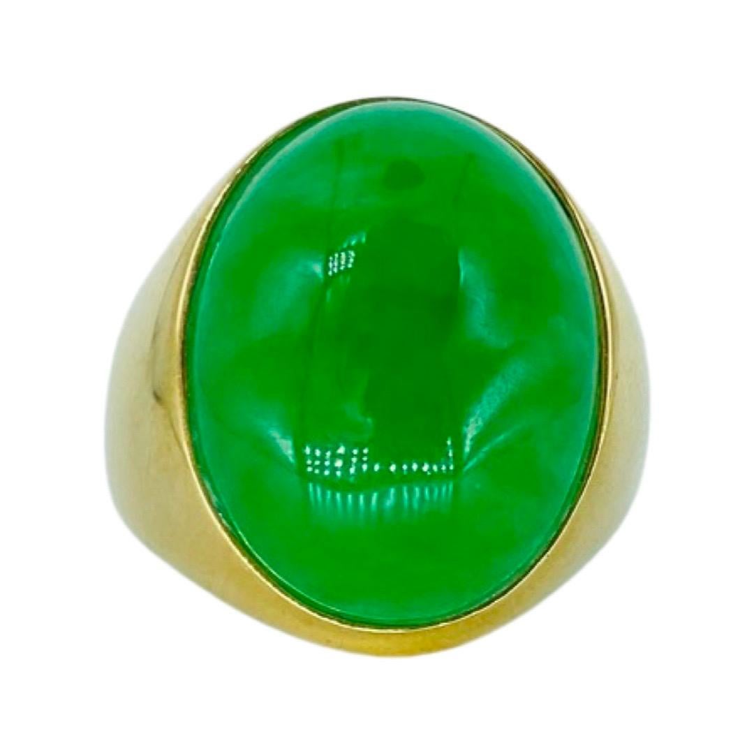 Vintage 16.65 Carat Jade Cabochon Dome Cocktail Ring 14k. The cabochon gemstone is a Jade and measures 20mm X 15mm X 6.85mm for an approx total weight of 16.65 carat. The ring is made of 14 karat gold and is a size 9.5