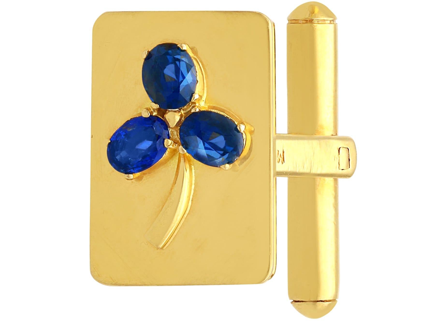 A stunning, fine and impressive pair of vintage 1950's 1.68 carat Burmese sapphire and 18 karat yellow gold cufflinks; part of our diverse sapphire jewellery and estate jewelry collections

These stunningvintage cufflinks have been crafted in 18k