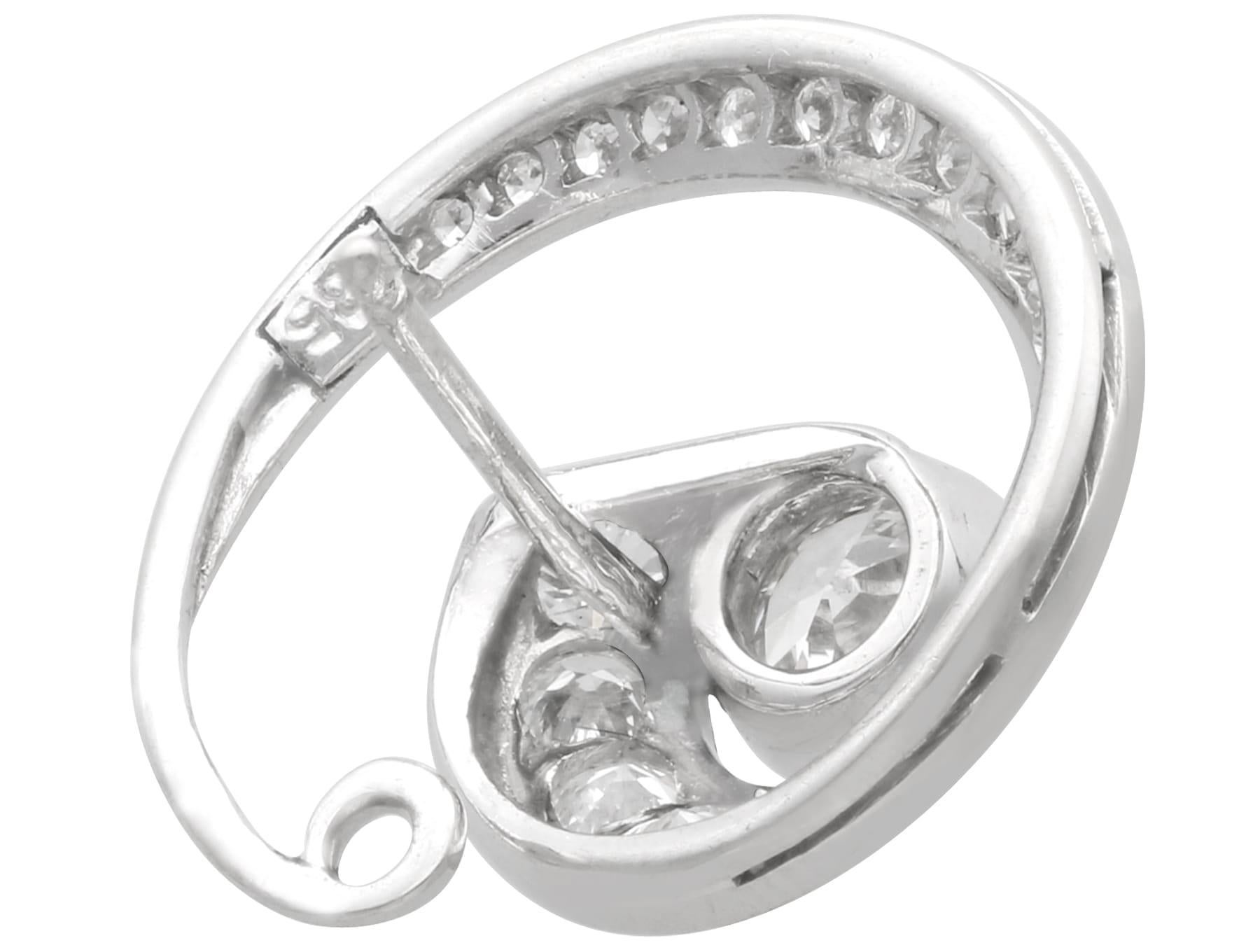 Women's or Men's Vintage 1.70 Carat Diamond and 14k White Gold Twirl Earrings Circa 1940 For Sale