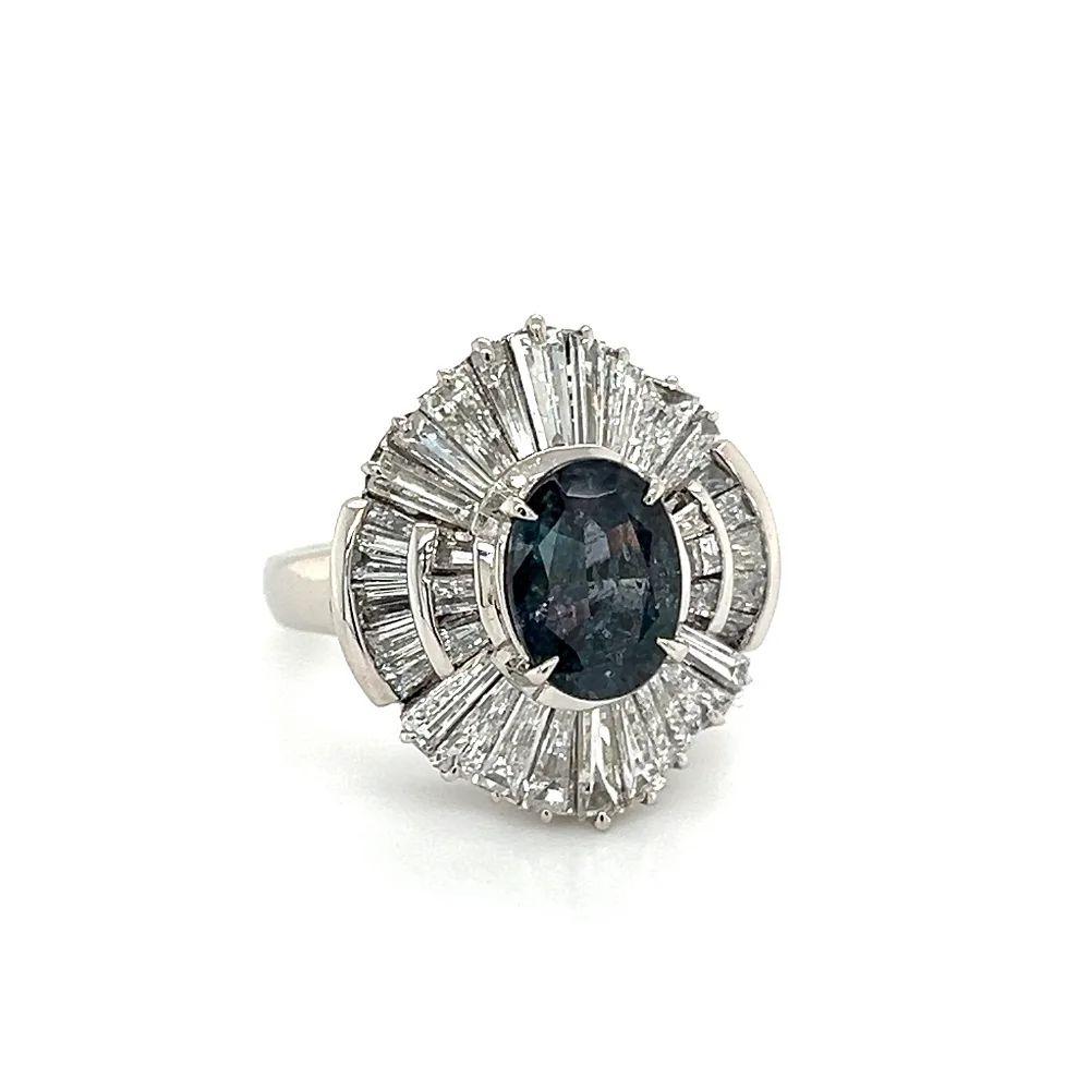 Simply Beautiful! Vintage Finely detailed Brazilian Alexandrite GIA and Diamond Platinum Cocktail Ring. Centering a Hand set securely nestled Oval Alexandrite, Green Blue-changing to Purple, weighing approx. 1.70 Carat. GIA report #2231134097.