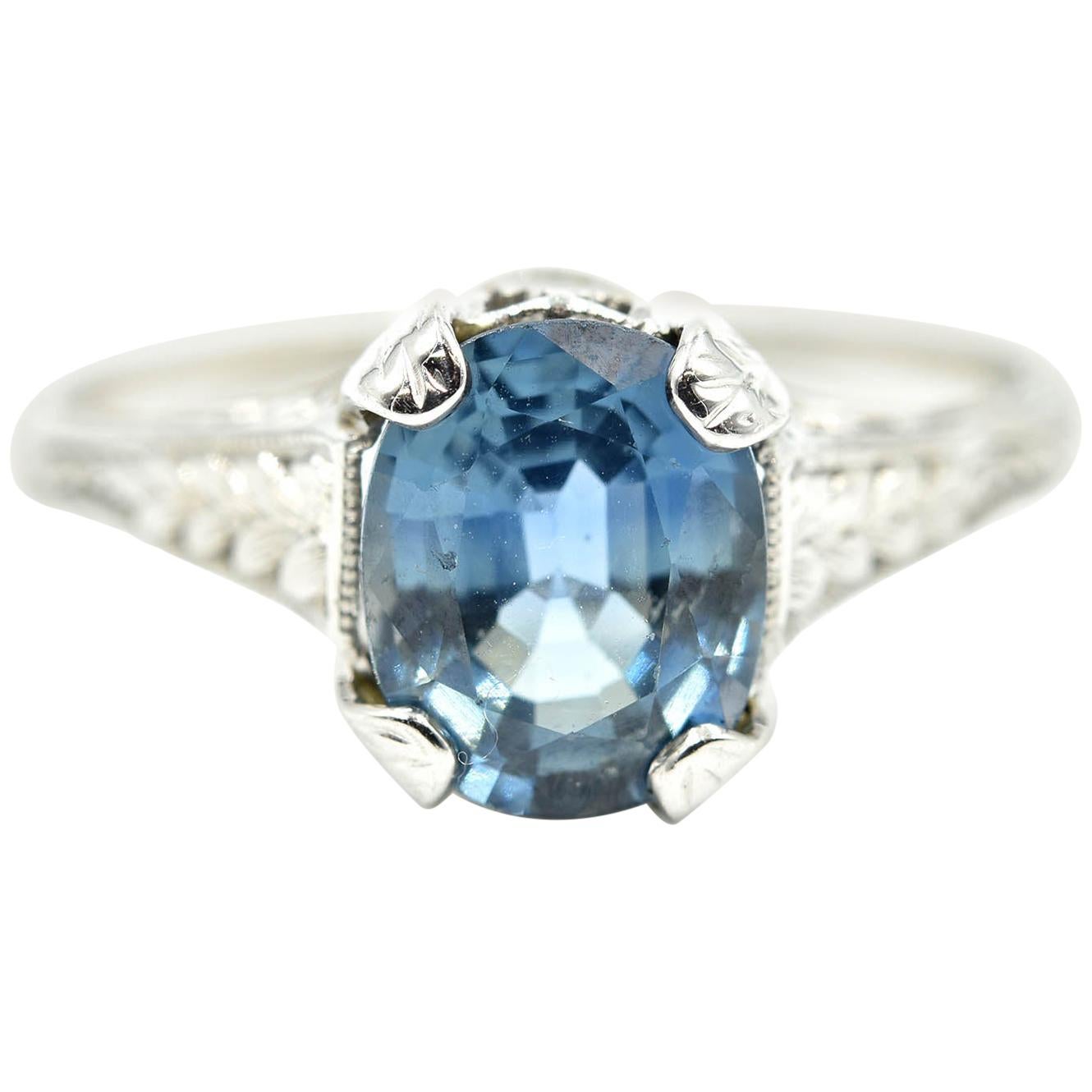Vintage 1.70 Carat Oval Blue Sapphire Platinum Ring For Sale