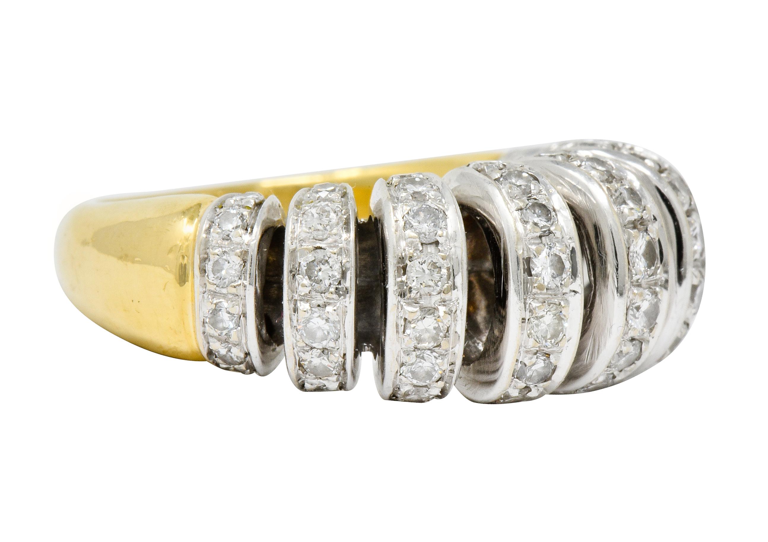 Ruched bombè style ring with a white gold top designed as airy segmented loops

Bead set throughout by round brilliant cut diamonds weighing in total approximately 1.72 carats, G to I color with VS clarity

Completed by a polished yellow gold