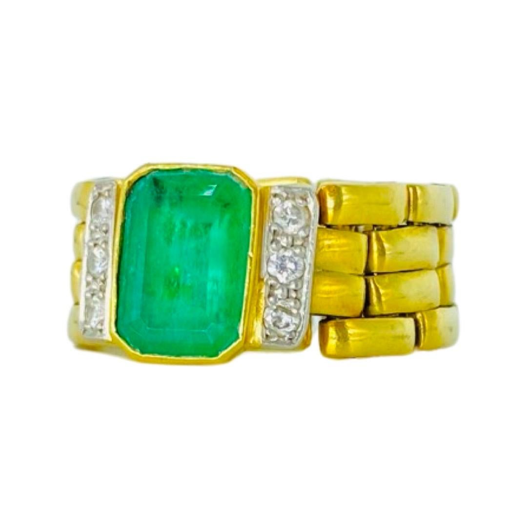 Vintage 1.75 Carat Colombian Emerald and Diamonds Ring 18k Gold. The center emerald weights approx 1.75 carat by measurements 10mm X 3.35mm X 7.5mm. The origin of the emerald is Colombia. The ring also features 0.06 carat total. weight of diamonds