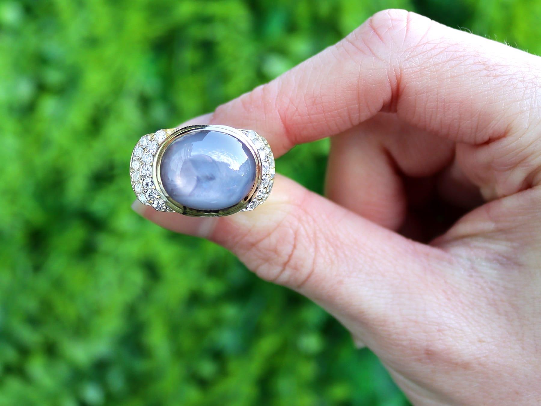 A stunning antique 1980's 17.50 carat star sapphire and 0.98 carat diamond, 18 karat yellow gold dress ring; part of our diverse antique jewelry and estate jewelry collections

This stunning, fine and impressive vintage sapphire and diamond ring has