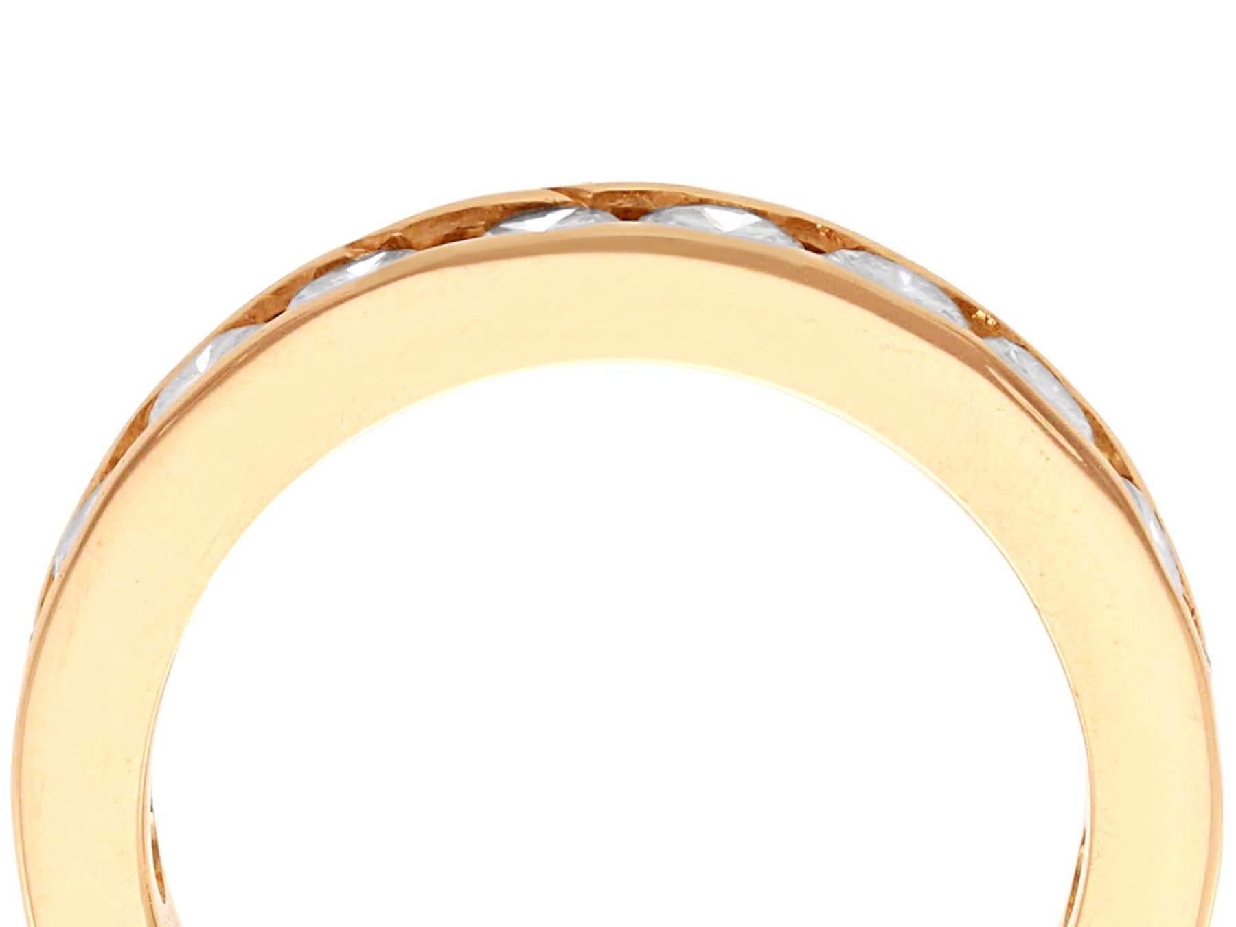 A fine and impressive vintage 1950's 1.76 carat diamond and 18 karat rose gold three quarter eternity ring; part of our diverse diamond jewellery and estate jewelry collections.

This fine and impressive vintage eternity ring has been crafted in 18k