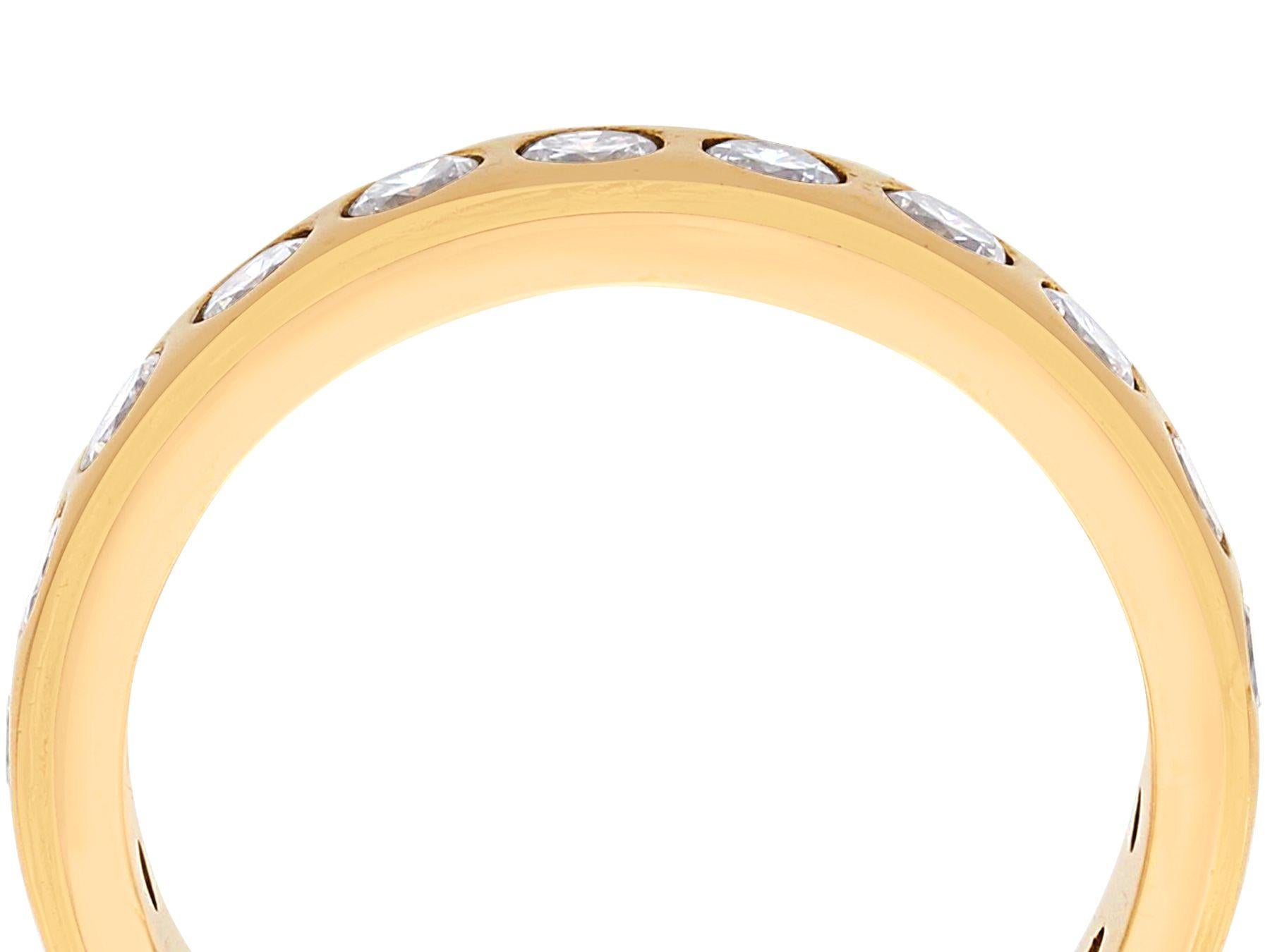 A stunning vintage 1960s 1.76 carat diamond and 18 karat yellow gold full eternity ring; part of our diverse diamond jewelry and estate jewelry collections.

This stunning, fine and impressive vintage eternity ring has been crafted in 18k yellow