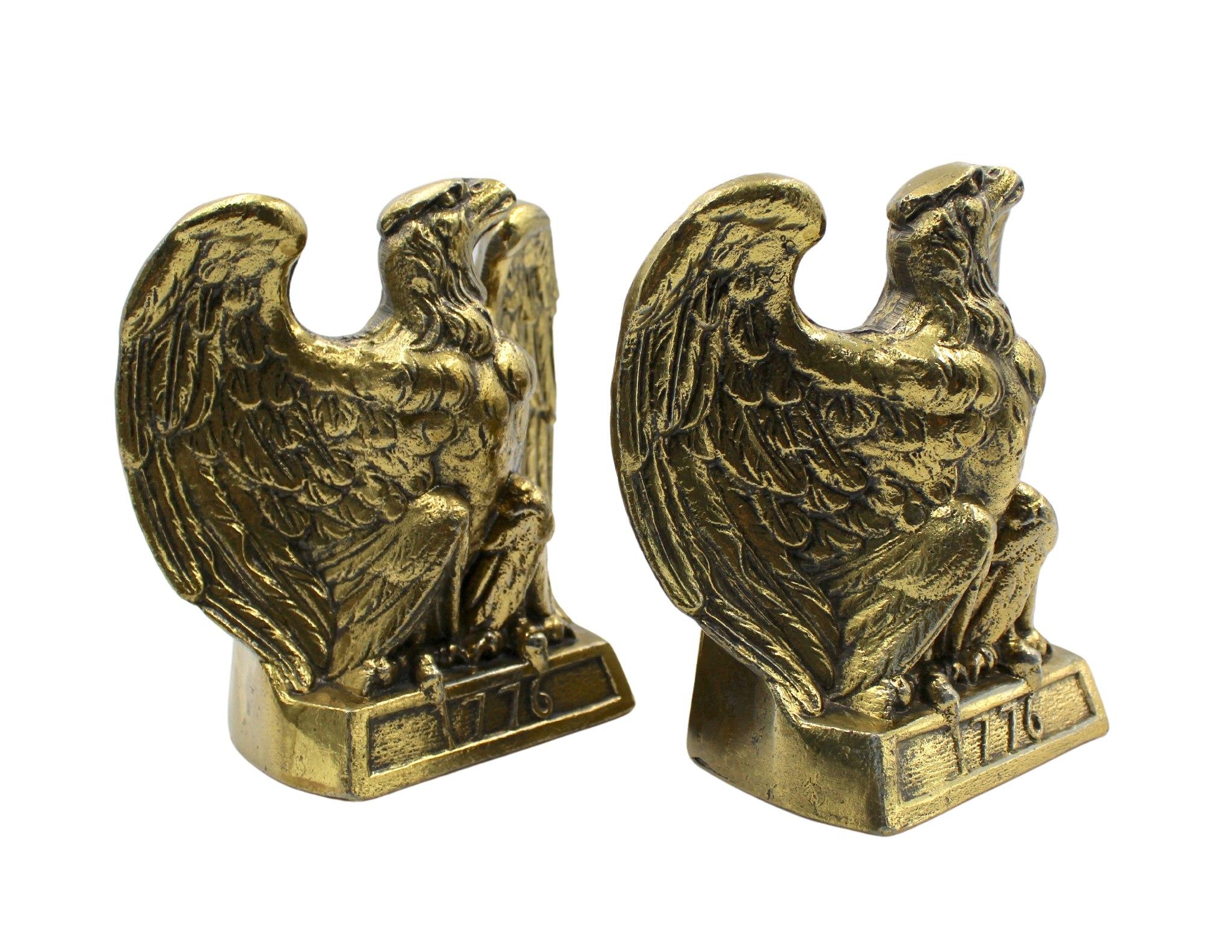 These appealing vintage brass bookends depict a bald eagle preparing for flight after perching on a base inscribed with “1776.” The bookends were made by Colonial Virginia, a crafter working out of Hampton, Virginia in 1972. The realistic detail of