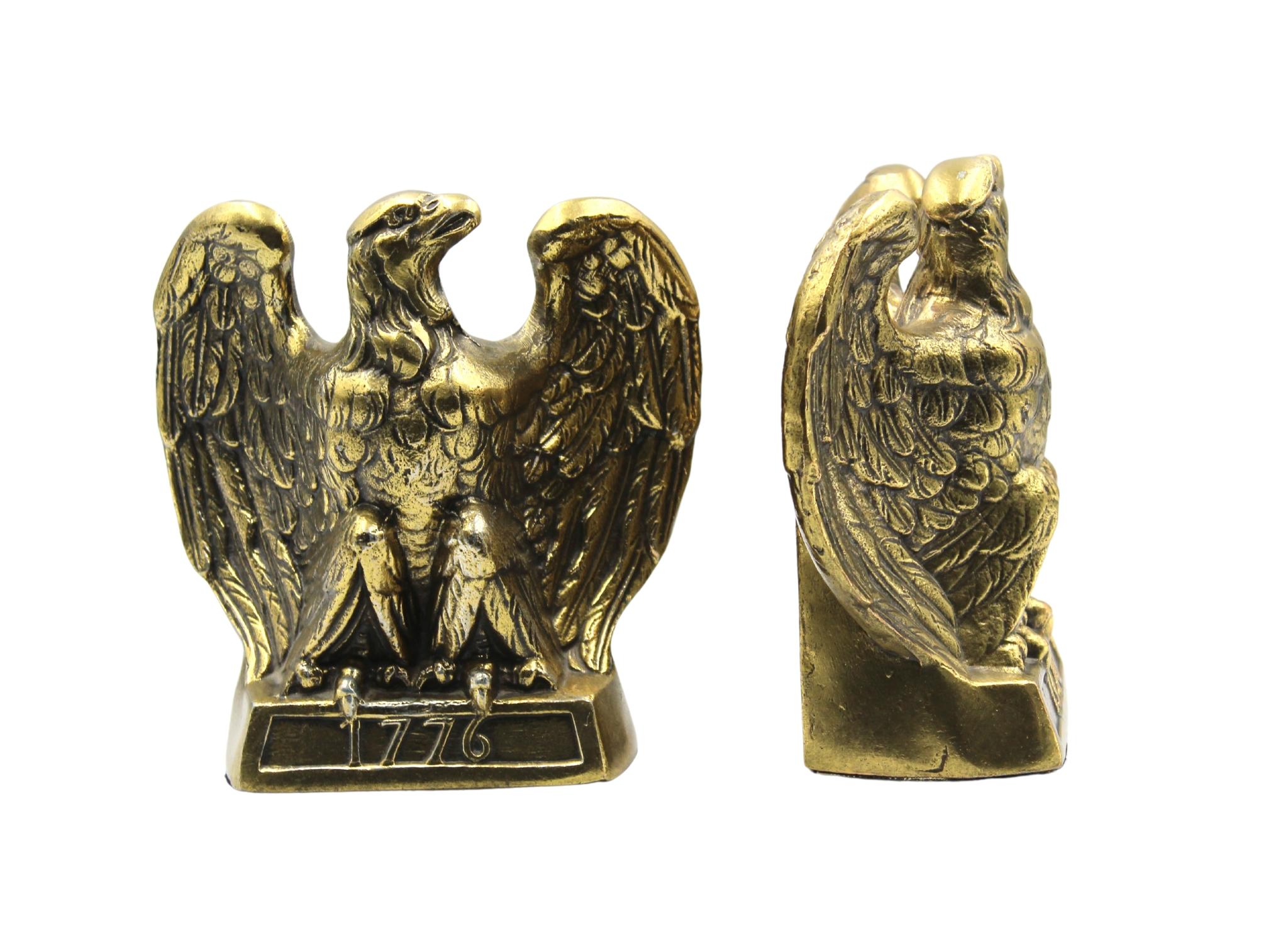 This is an appealing set of vintage brass bookends. The bookends each depict a spread-wing bald eagle perched on a rectangular base, stamped with the date “1776.” The bookends were made by Colonial Virginia, a crafter working out of Hampton,