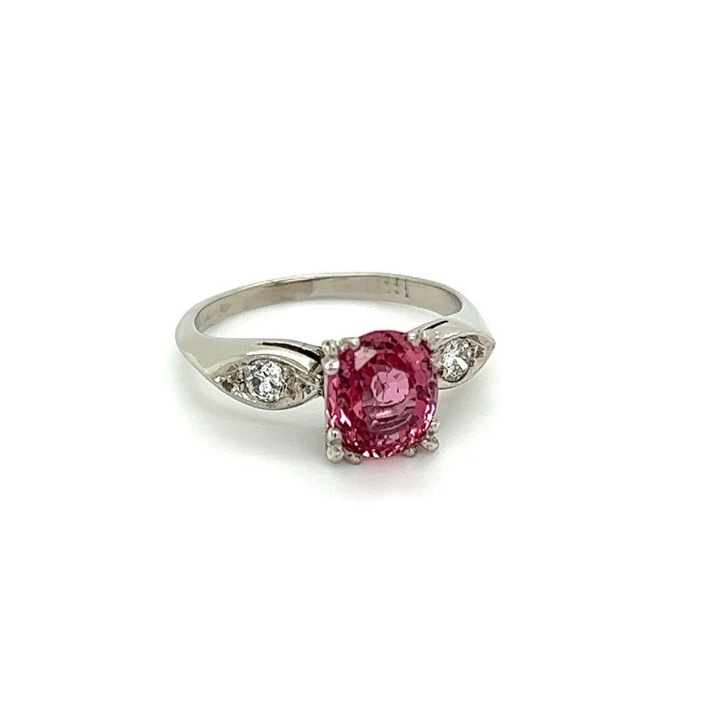 Simply Beautiful! Finely detailed Pink NO HEAT GIA Sapphire and Diamond Platinum Vintage Cocktail Ring. Centering a securely nestled Hand set, Natural Pink GIA NO HEAT Oval Sapphire weighing approx. 1.78 Carats. GIA lab report # 2235039034. Hand set
