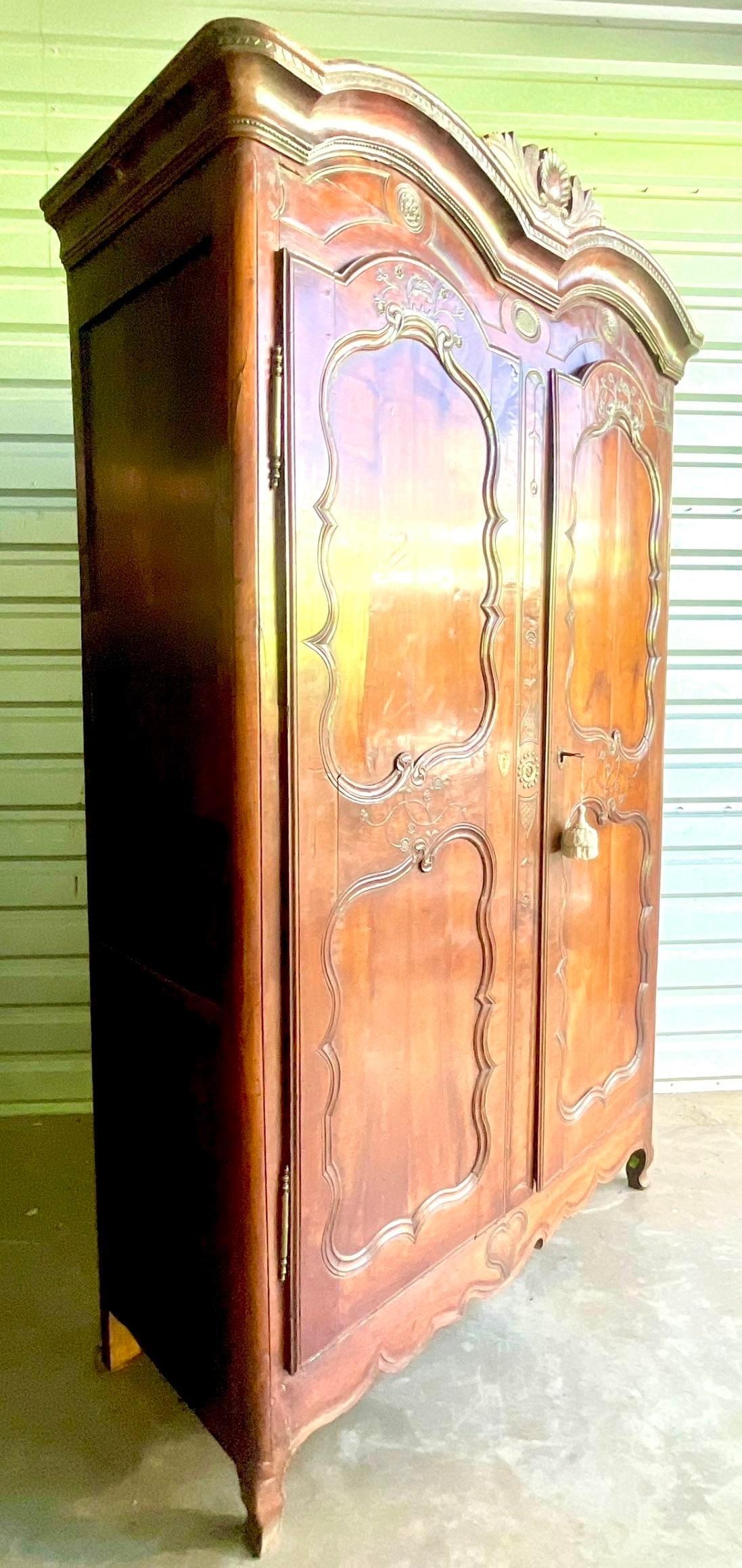 American Vintage 1780s Carved Chestnut Armoire For Sale
