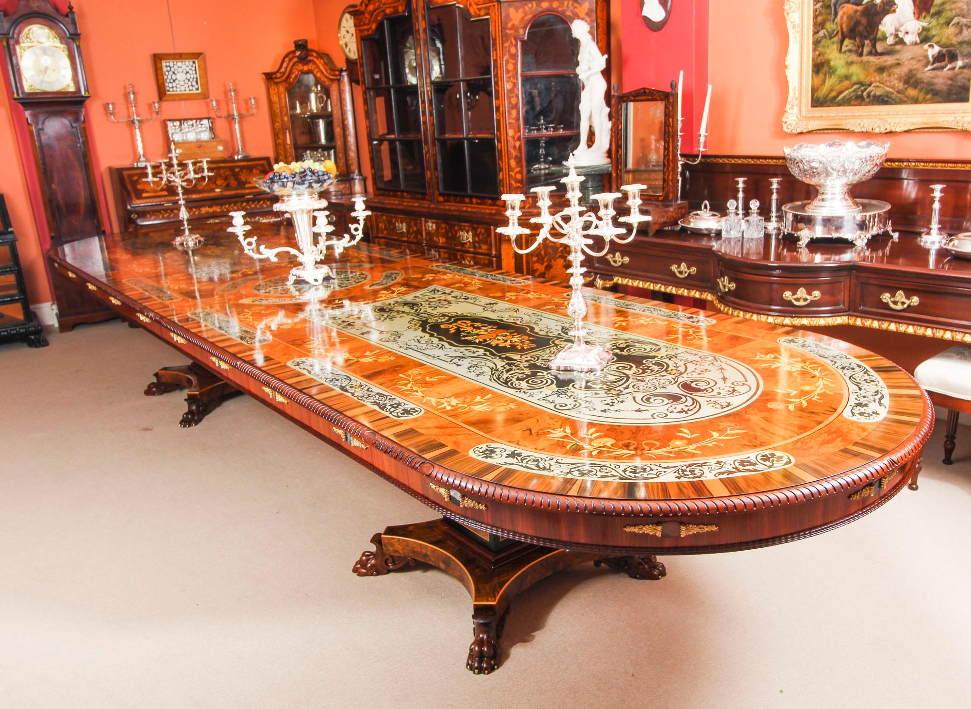 This is a wonderful vintage Victorian style large dining table.

Crafted in burr walnut it features exceptional quality marquetry with pewter, lapis lazuli and agate.

Seating sixteen people in royal comfort, it is an amazing piece of luxury