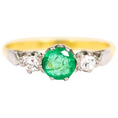 Antique 18 Carat and Platinum Emerald and Diamond Three-Stone Ring