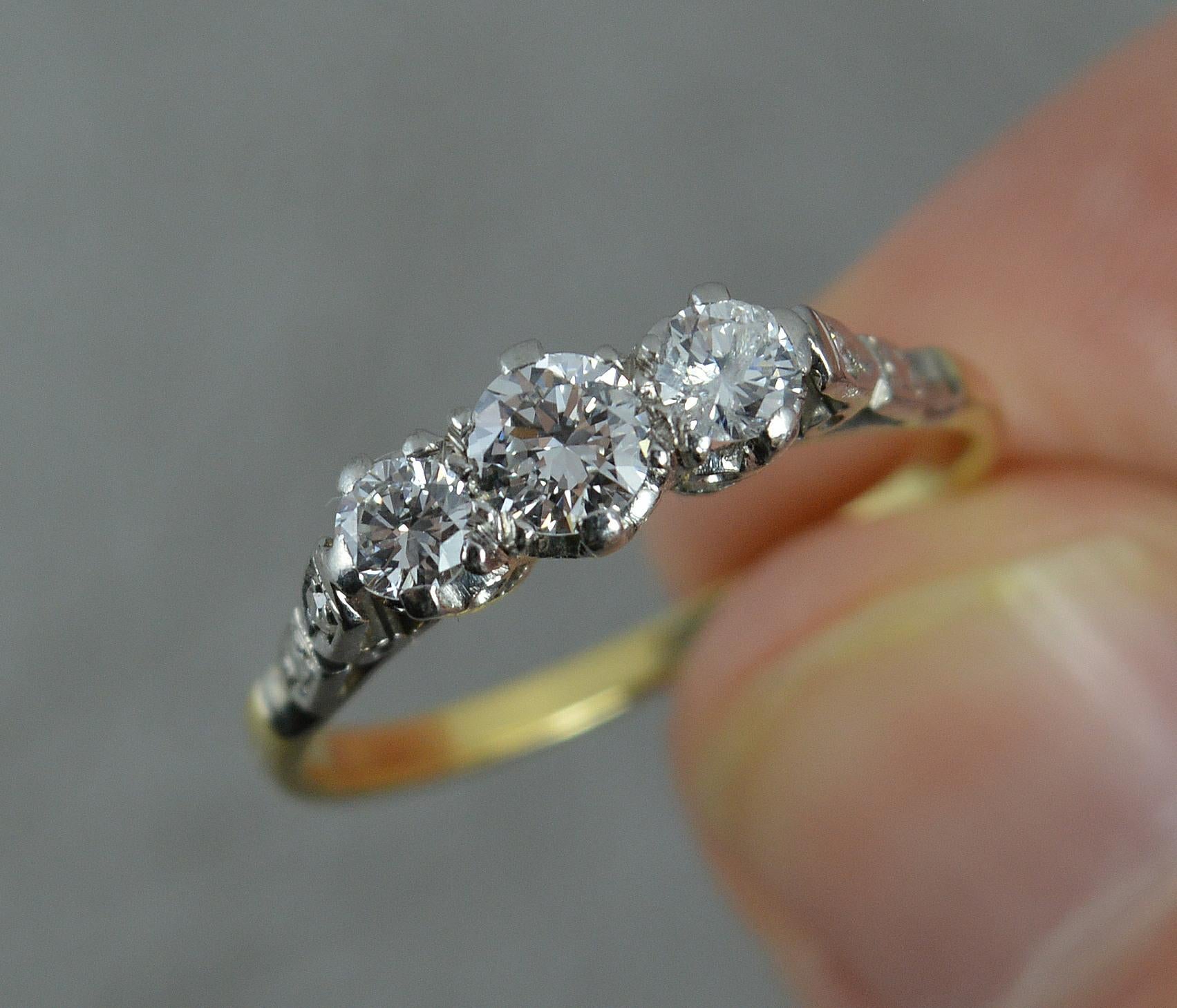 Vintage 18 Carat Gold and Platinum 0.7 Carat Diamond Trilogy Ring In Excellent Condition In St Helens, GB