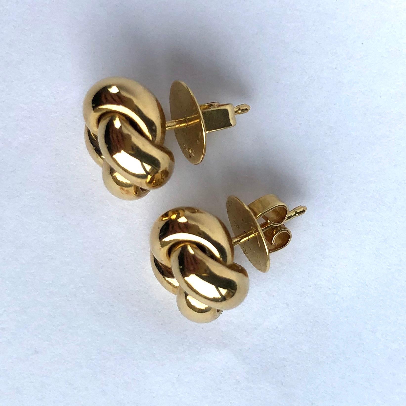 Glossy 18ct yellow gold superbly tied in a knot make the most stylish design for these earrings.

Knot Diameter: 12mm
Height From Ear: 6mm

Weight: 5.7g