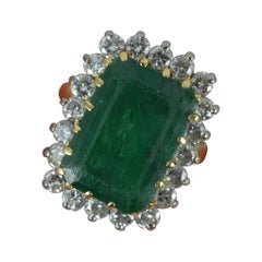 Vintage 18 Carat Gold Large Emerald and 1.20 Carat Diamond Cluster Ring